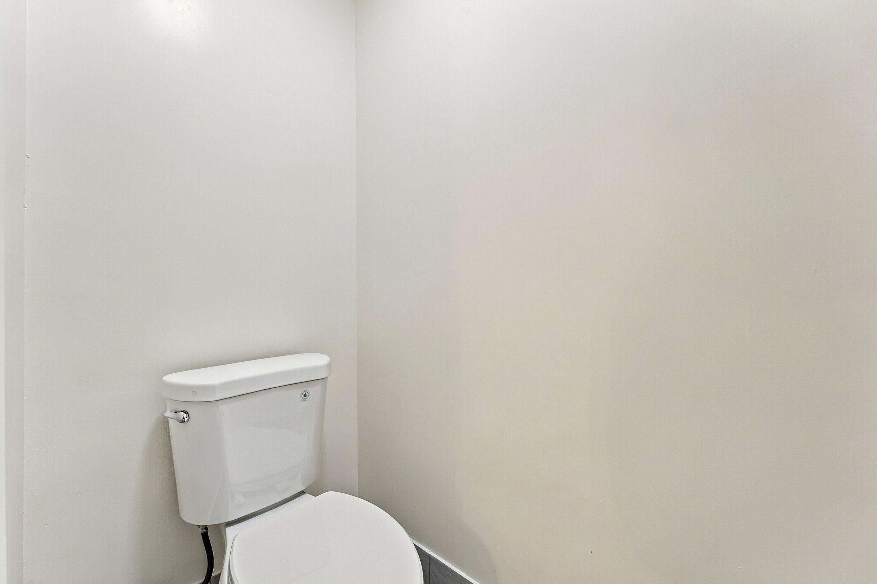 Separate toilet with it's own door for additional privacy