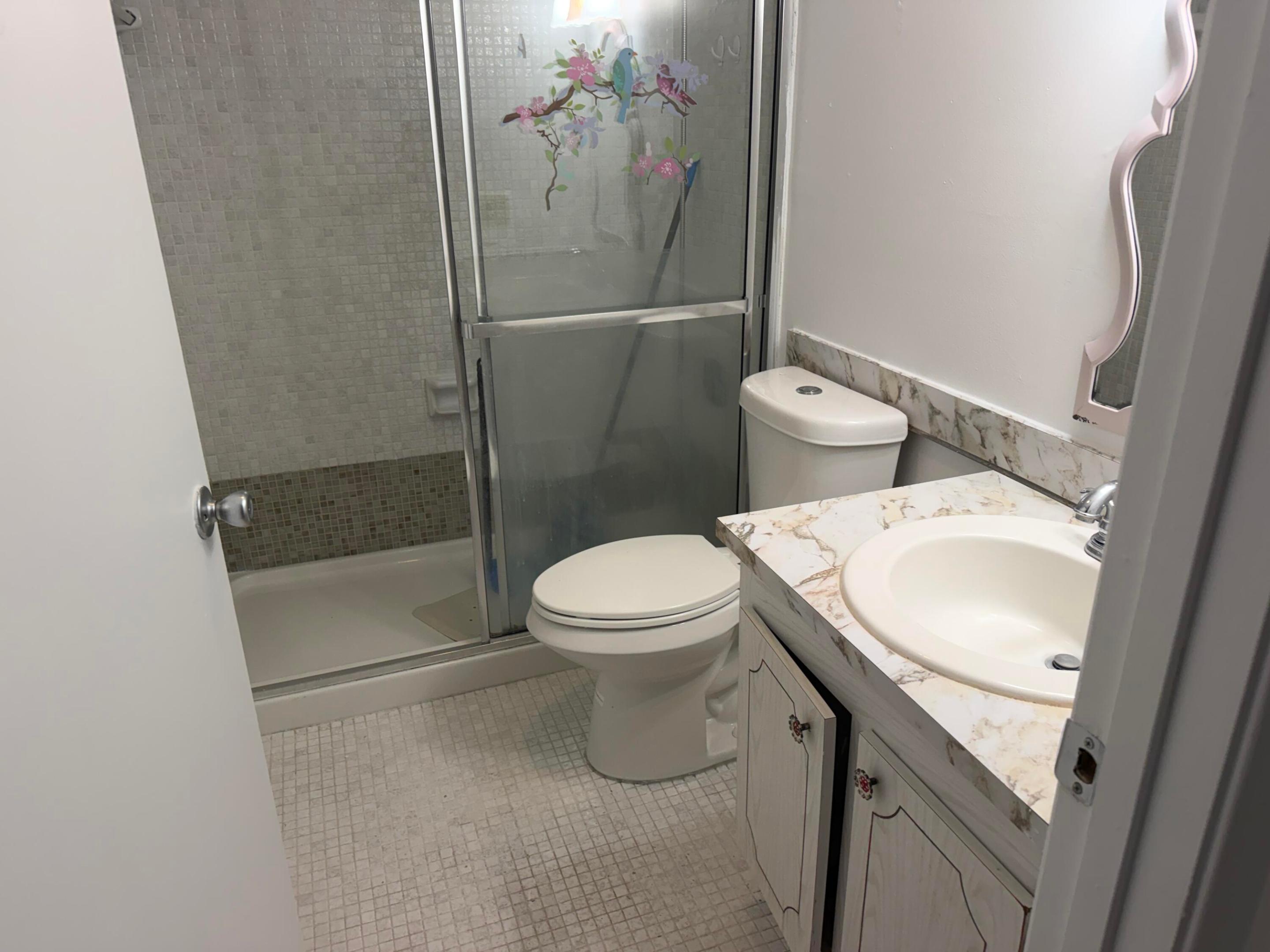 Shower stall in bathroom