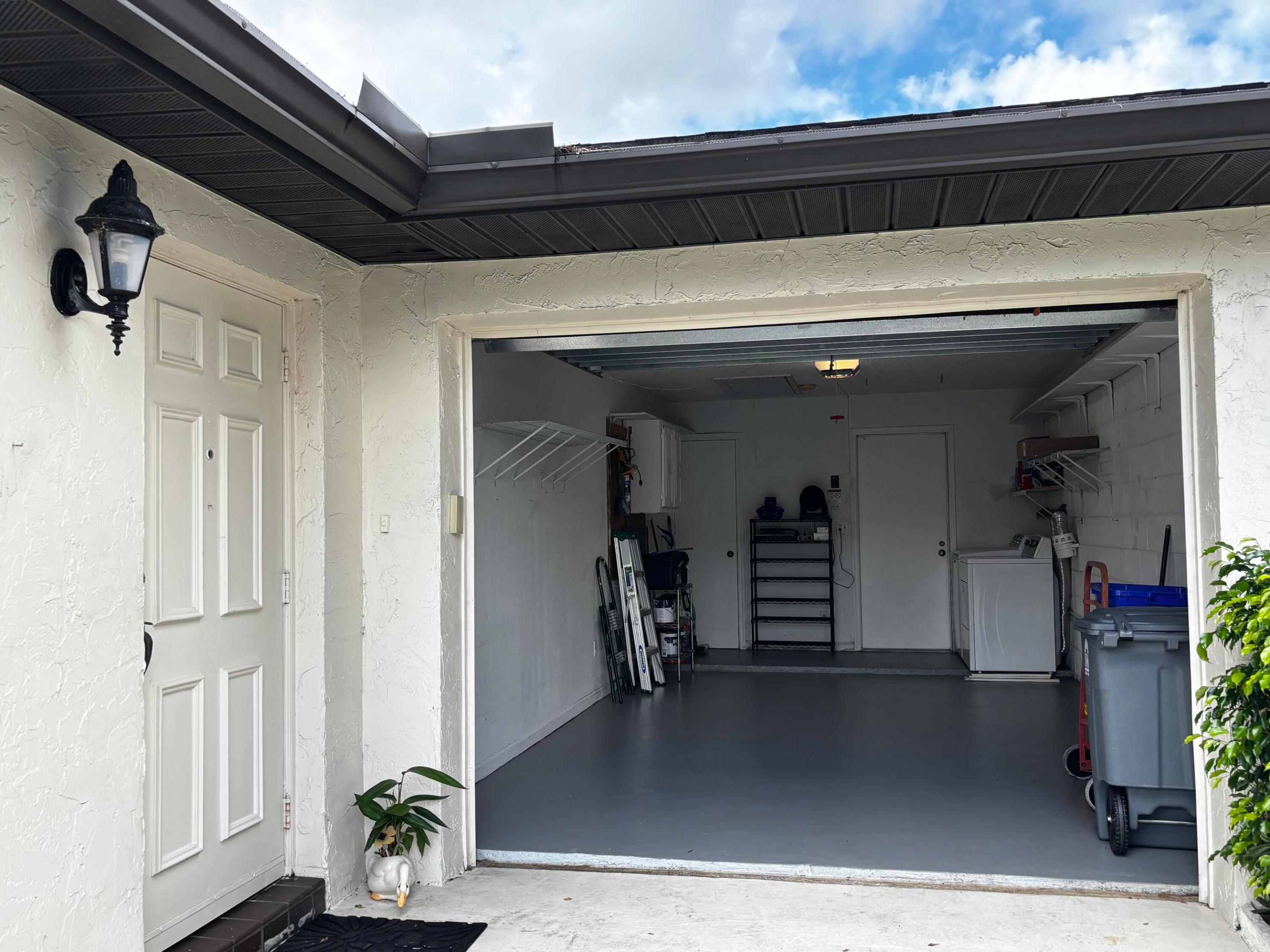One car garage with washer and dryer One car garage with washer and dryer