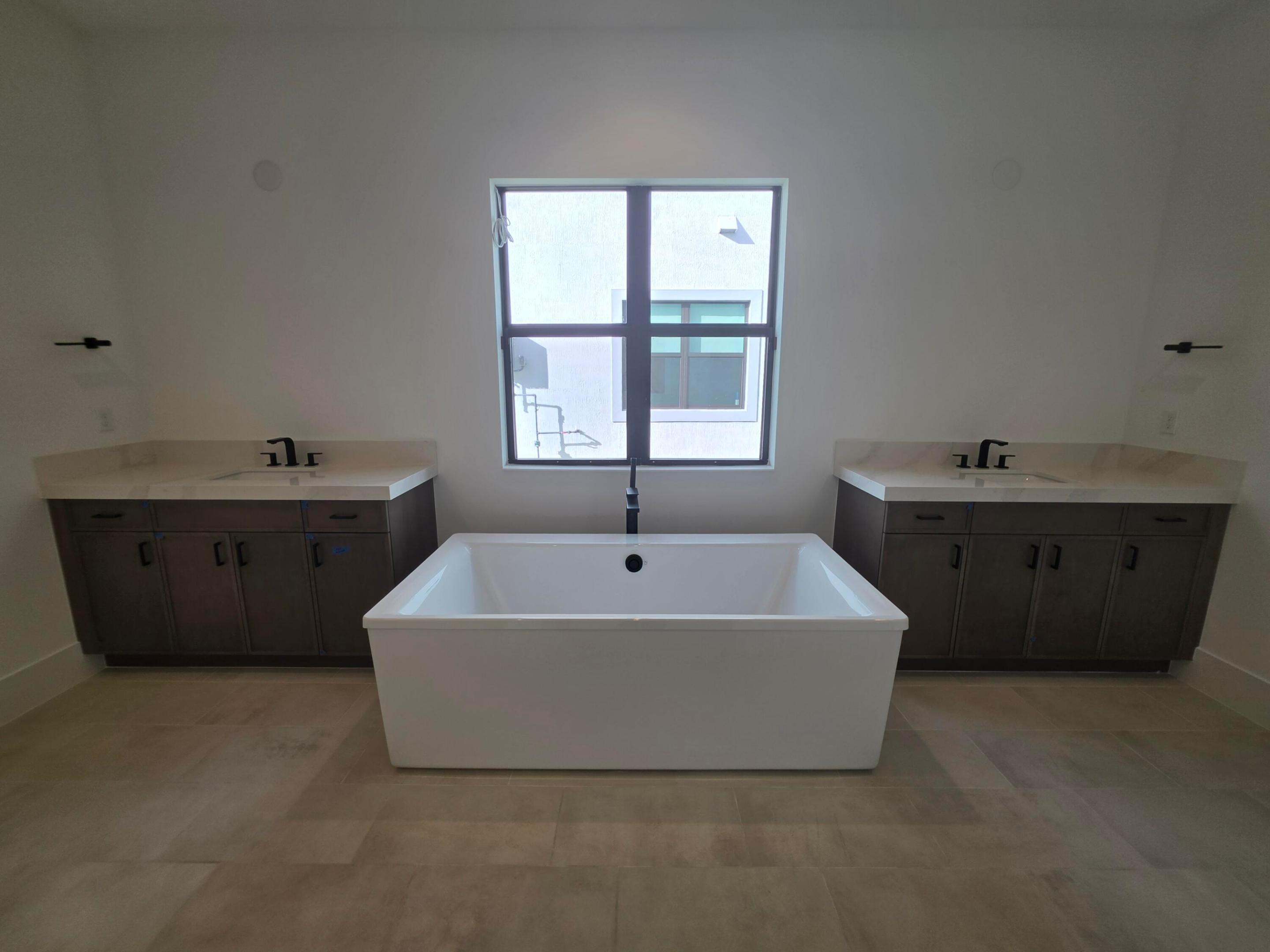 Primary Bathroom Vanities w/ 6' Freestanding Soaking Tub
