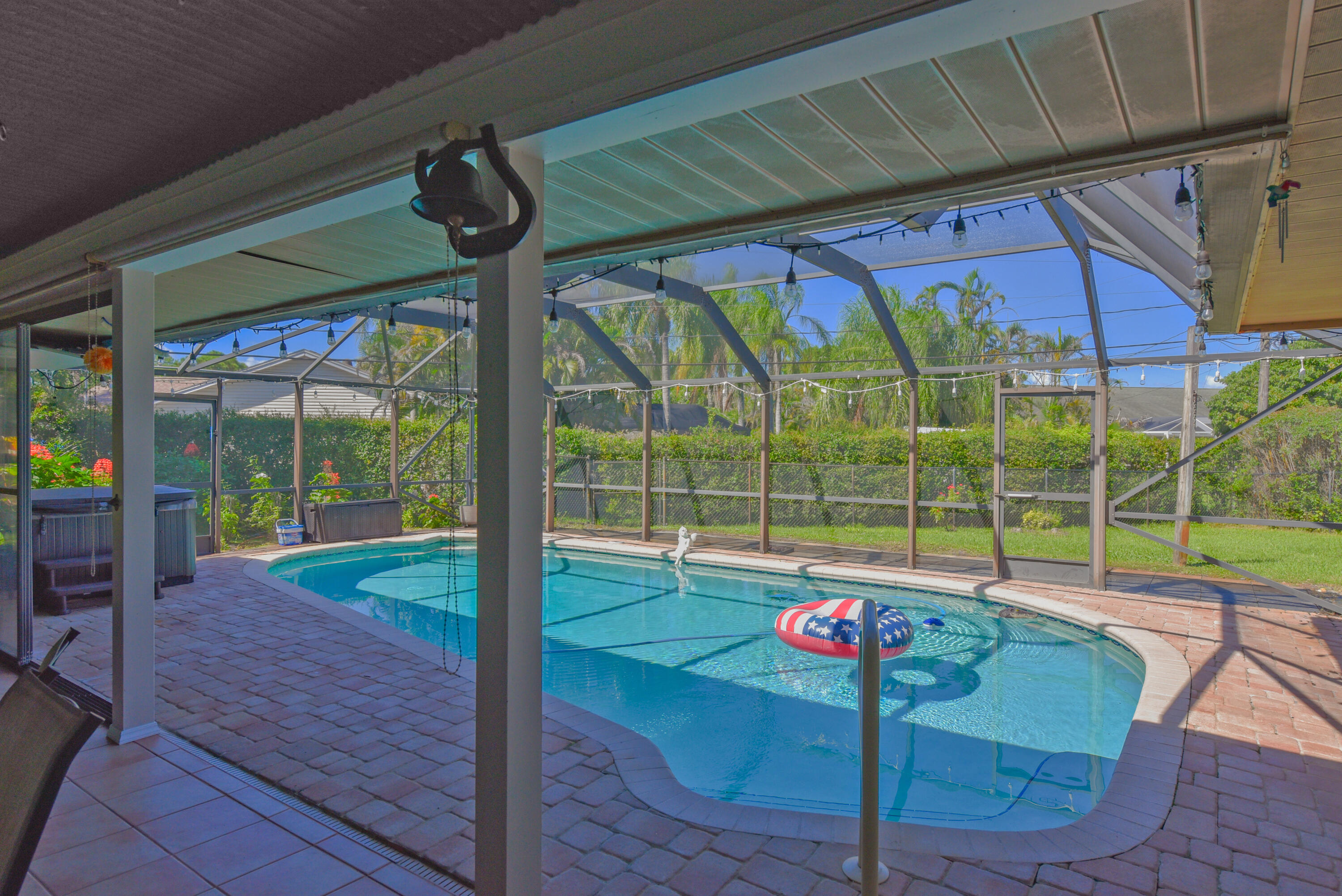 Enjoy your saltwater pool and spa, surrounded by beautiful paver decking and a screened enclosure. Perfect for outdoor entertaining and relaxation!
