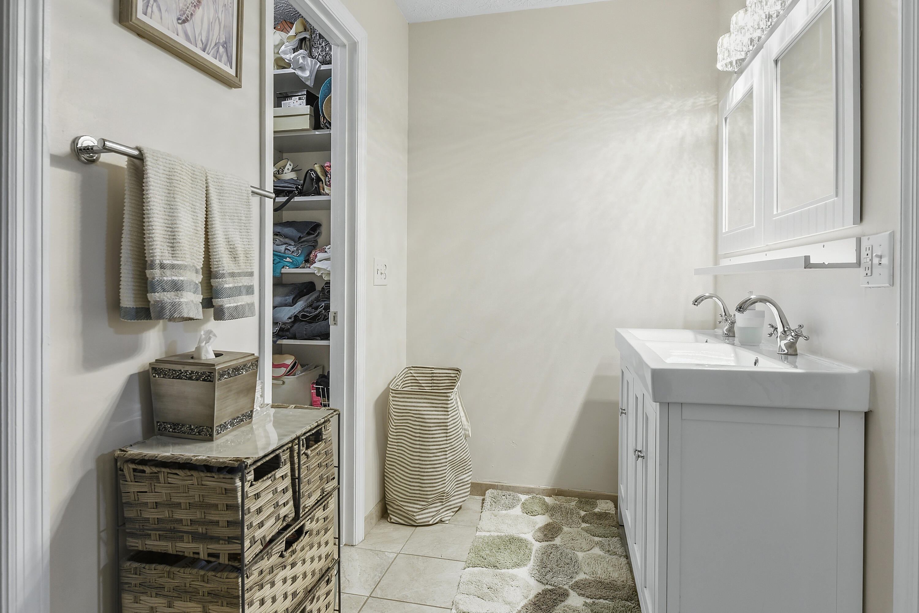 The primary suite features two separate walk-in closets, offering plenty of personal storage and organization. A wonderful feature for keeping everything in its place!