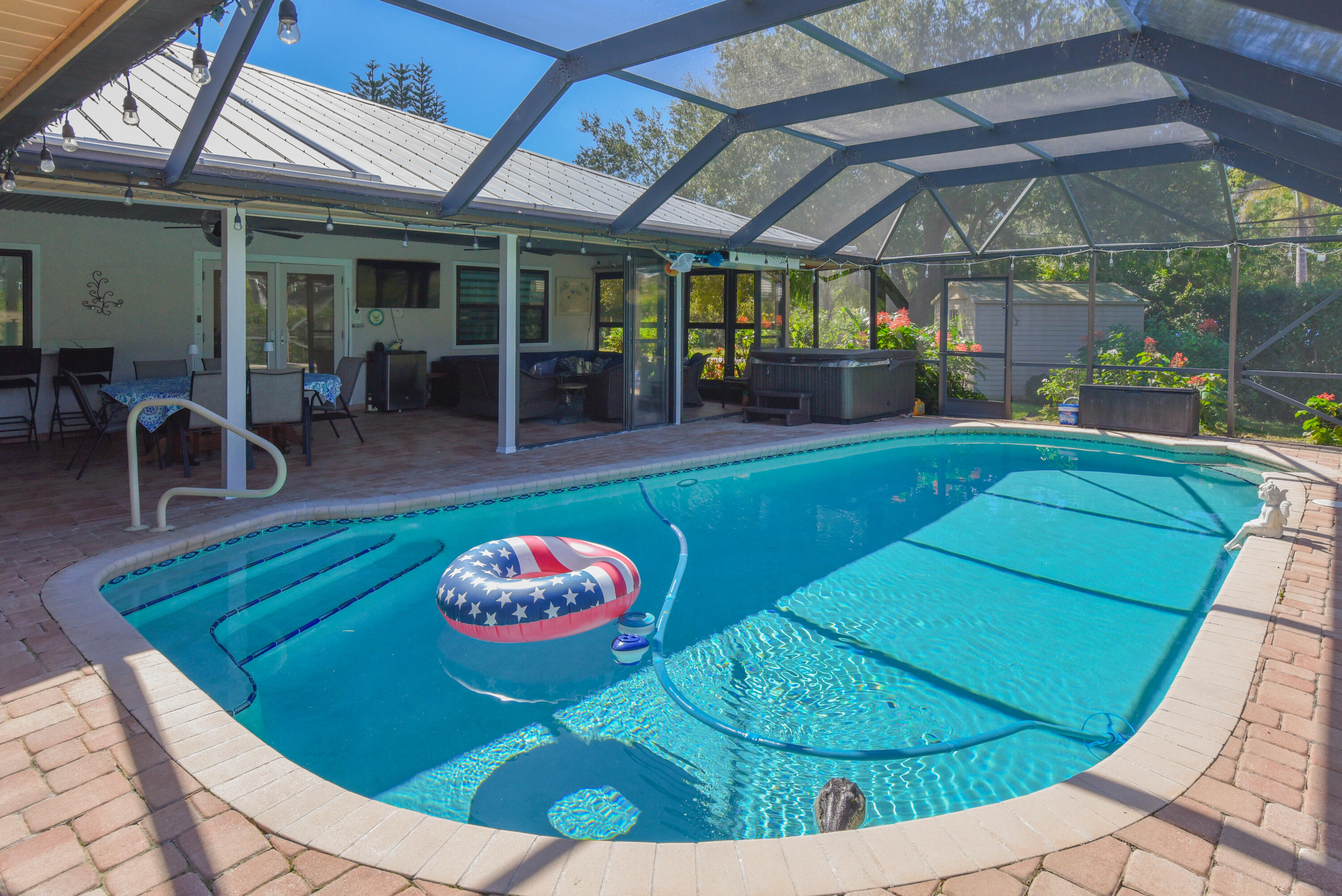 Enjoy Florida living at its finest! Heated saltwater pool, relaxing spa, and expansive covered lanai with plenty of room to entertain family and friends.