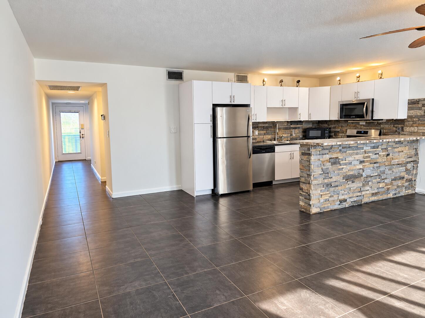 Modern Stone-Accent Kitchen and Hallway