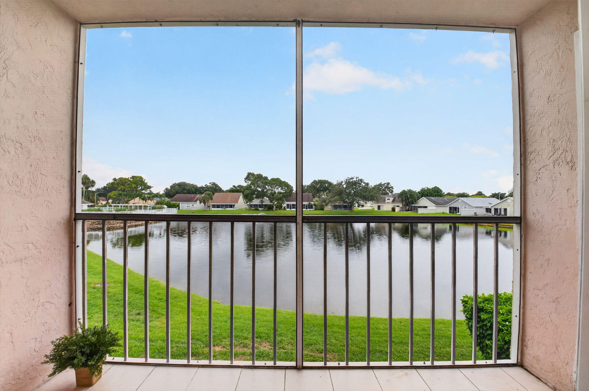 View of lake and fountain from balcony.