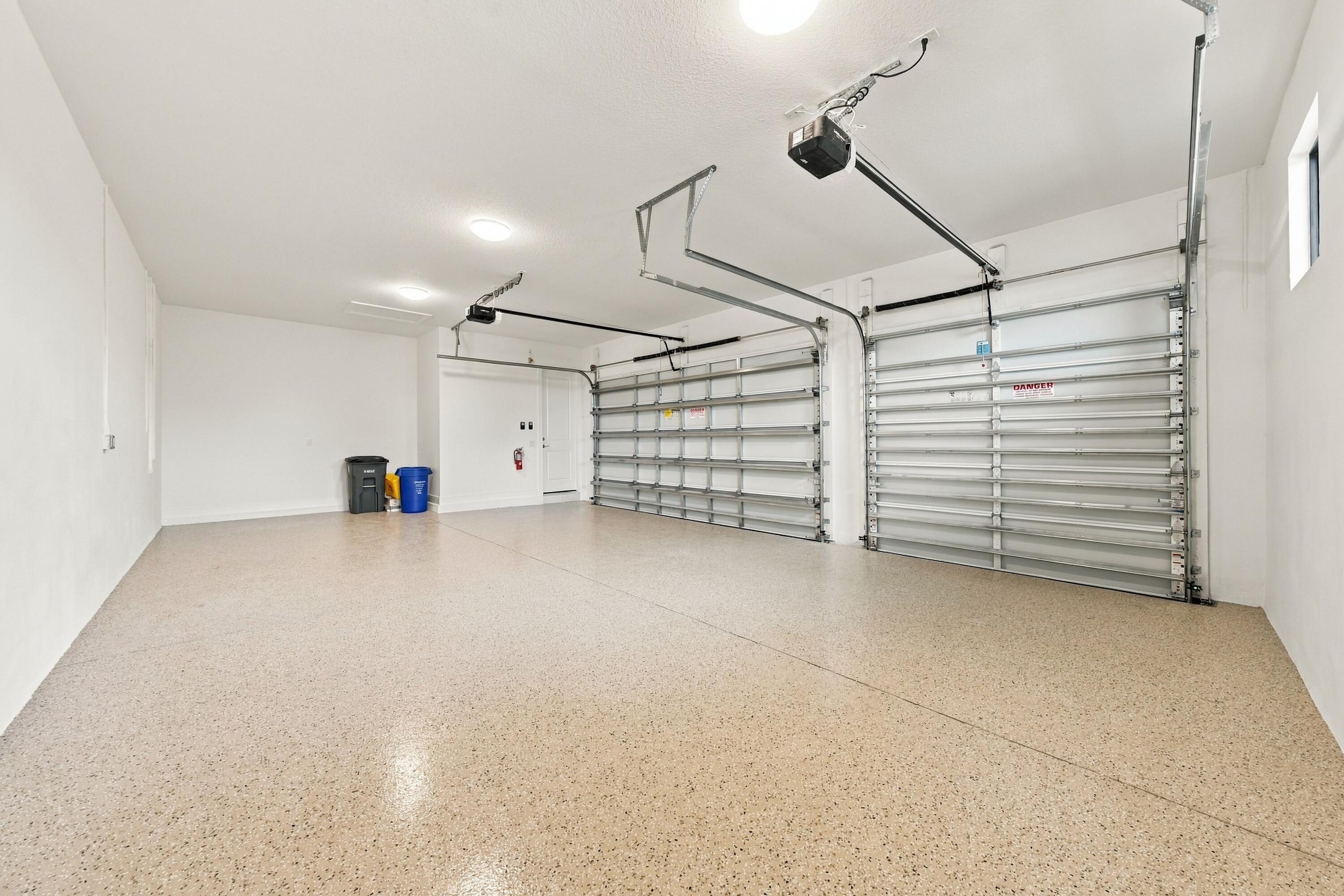 3 car garage with epoxy floors