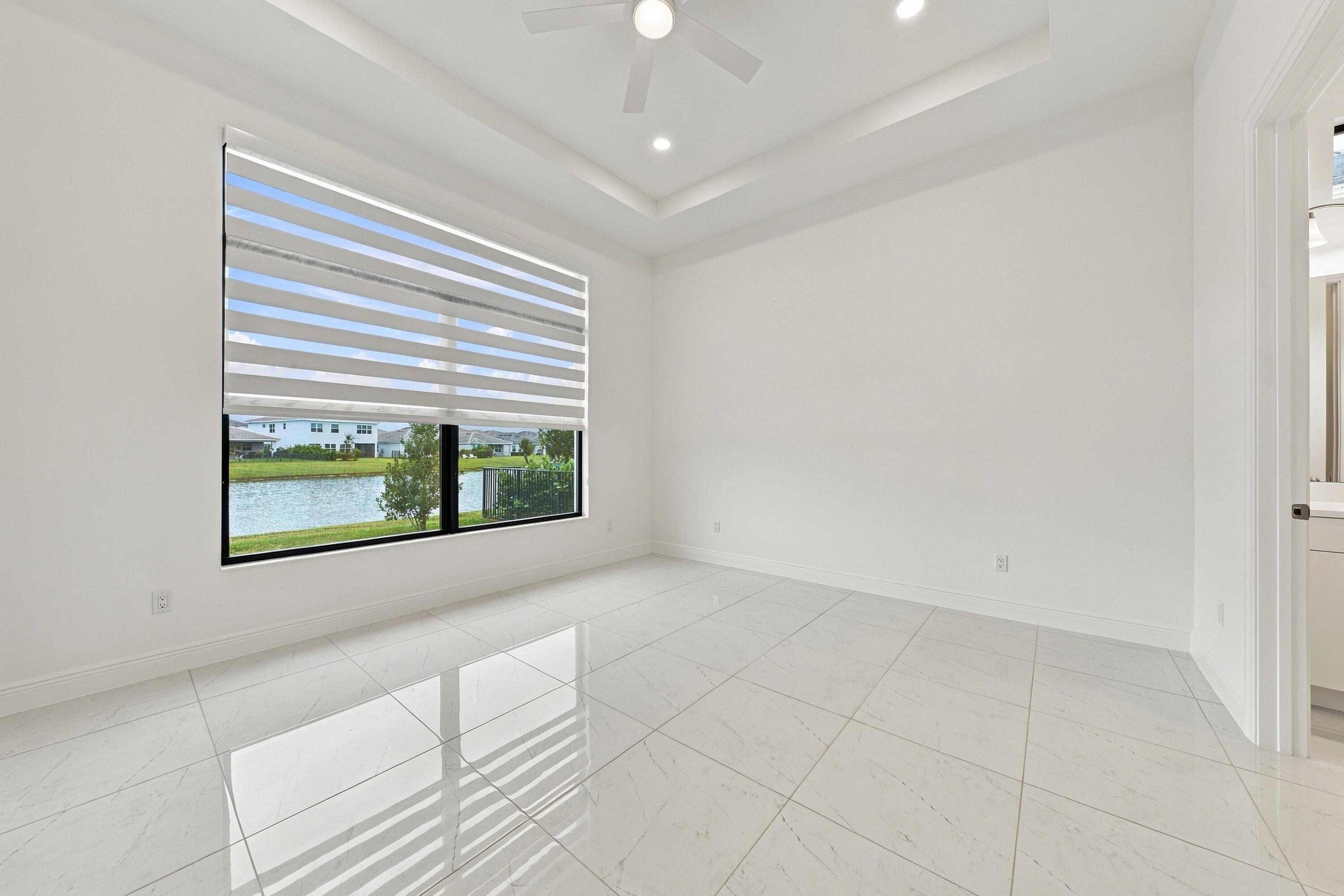 Primary suite with lakefront views