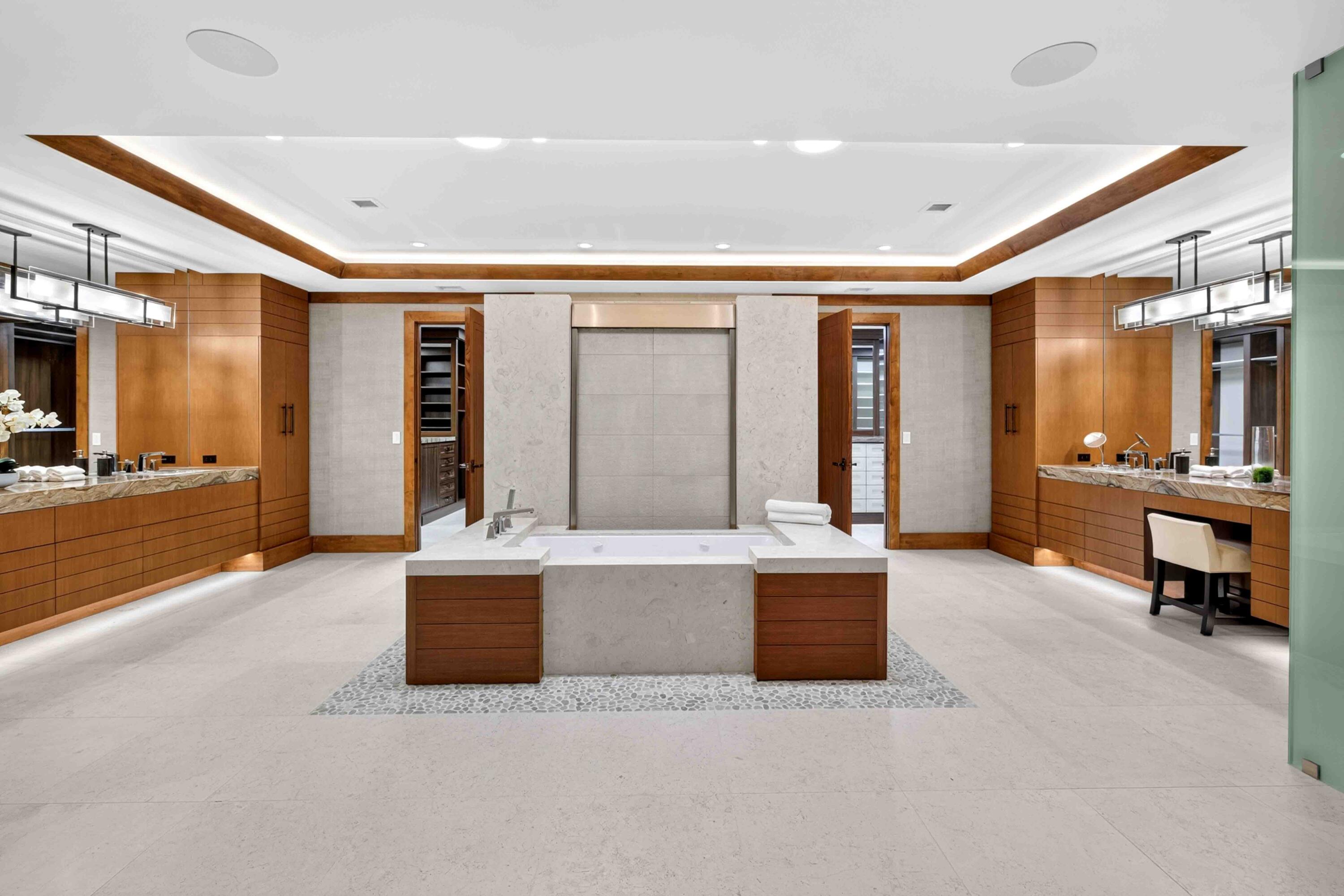 Primary Bathroom with His & Her Sinks and Toilets