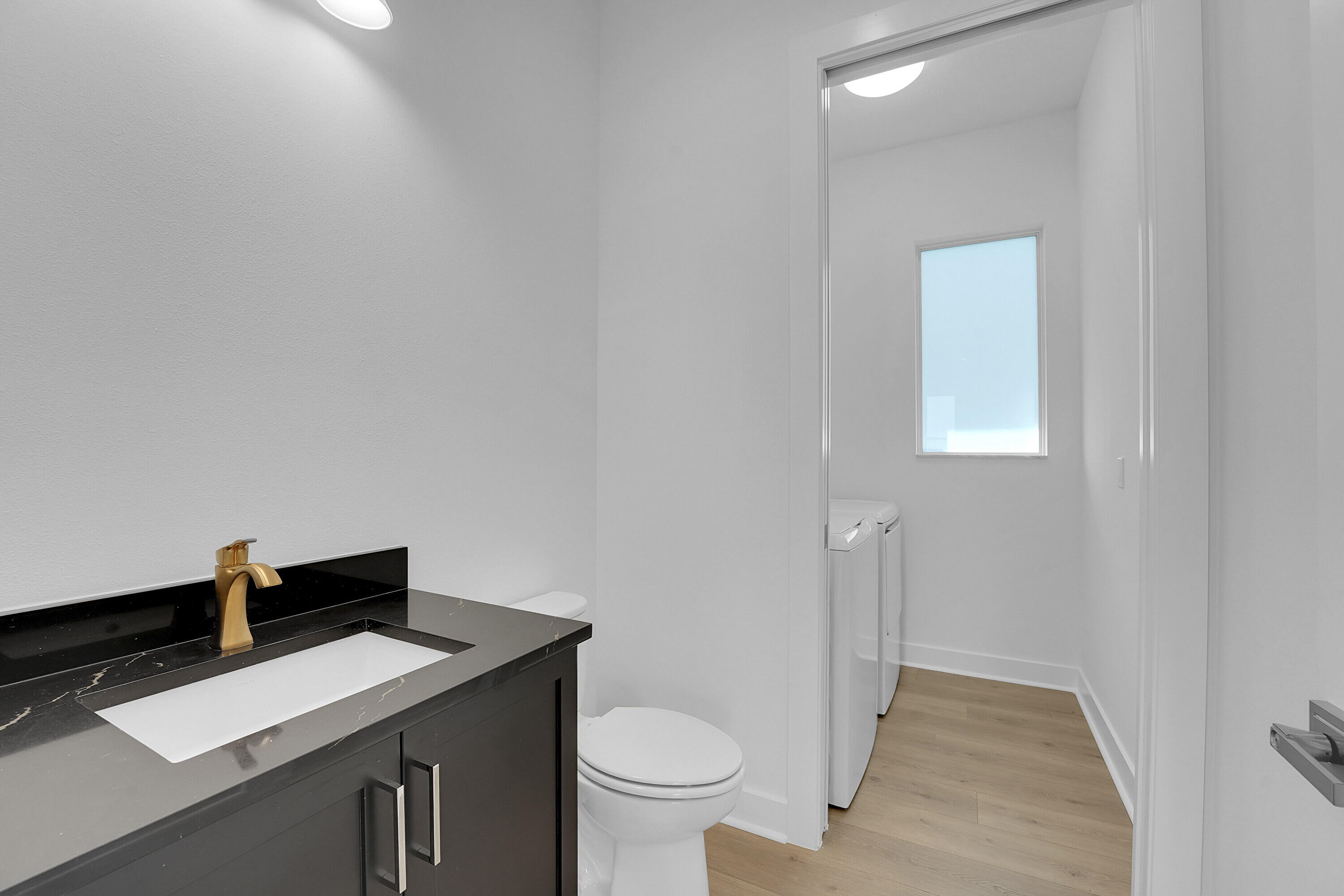 Main floorHalf Bathroom and Laundry Room