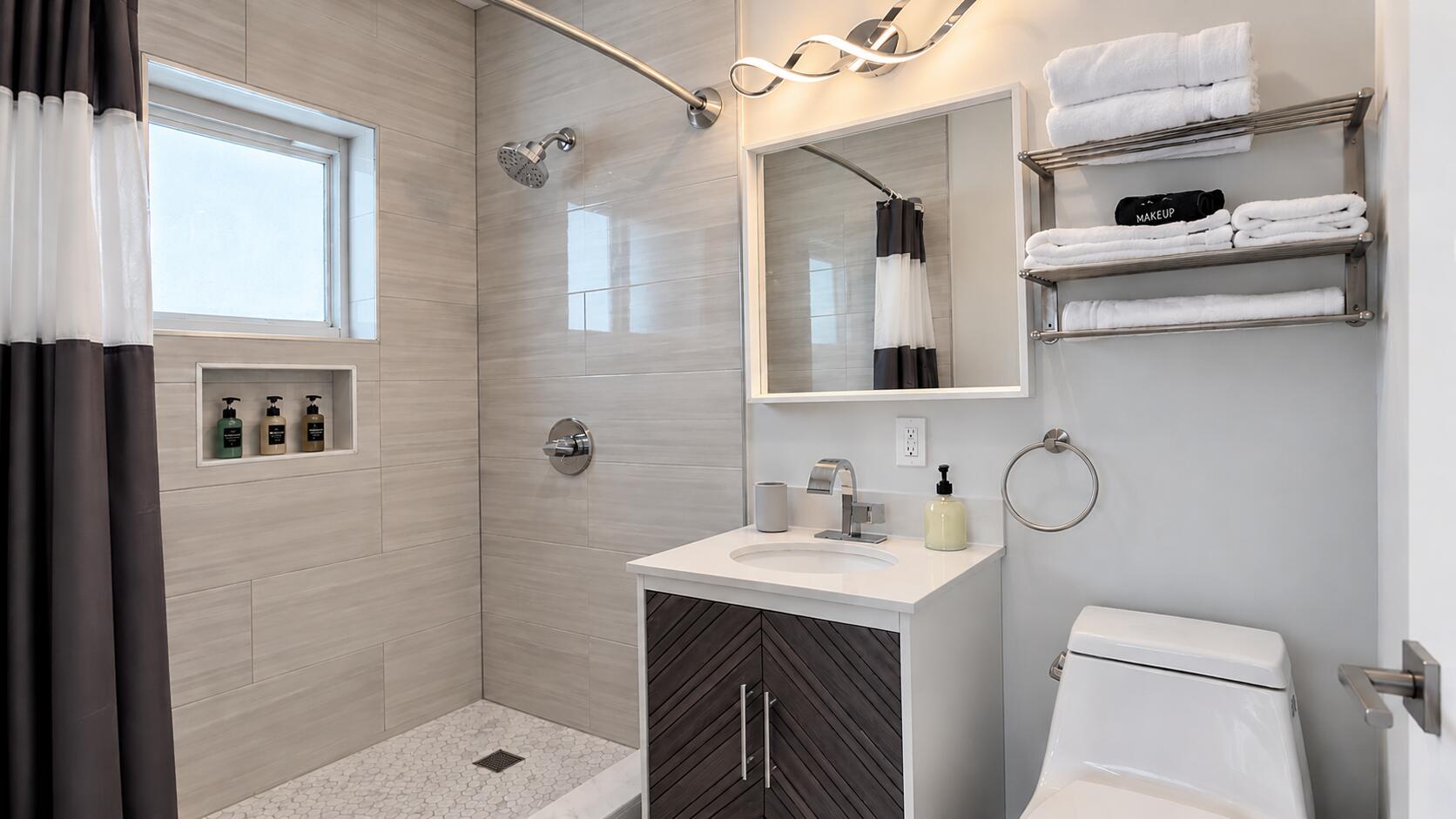 Modern Charcoal-Slat Bathroom Oasis