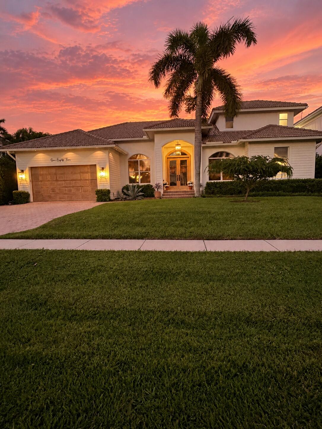 Dreamy Sunset Over Modern Suburban Home