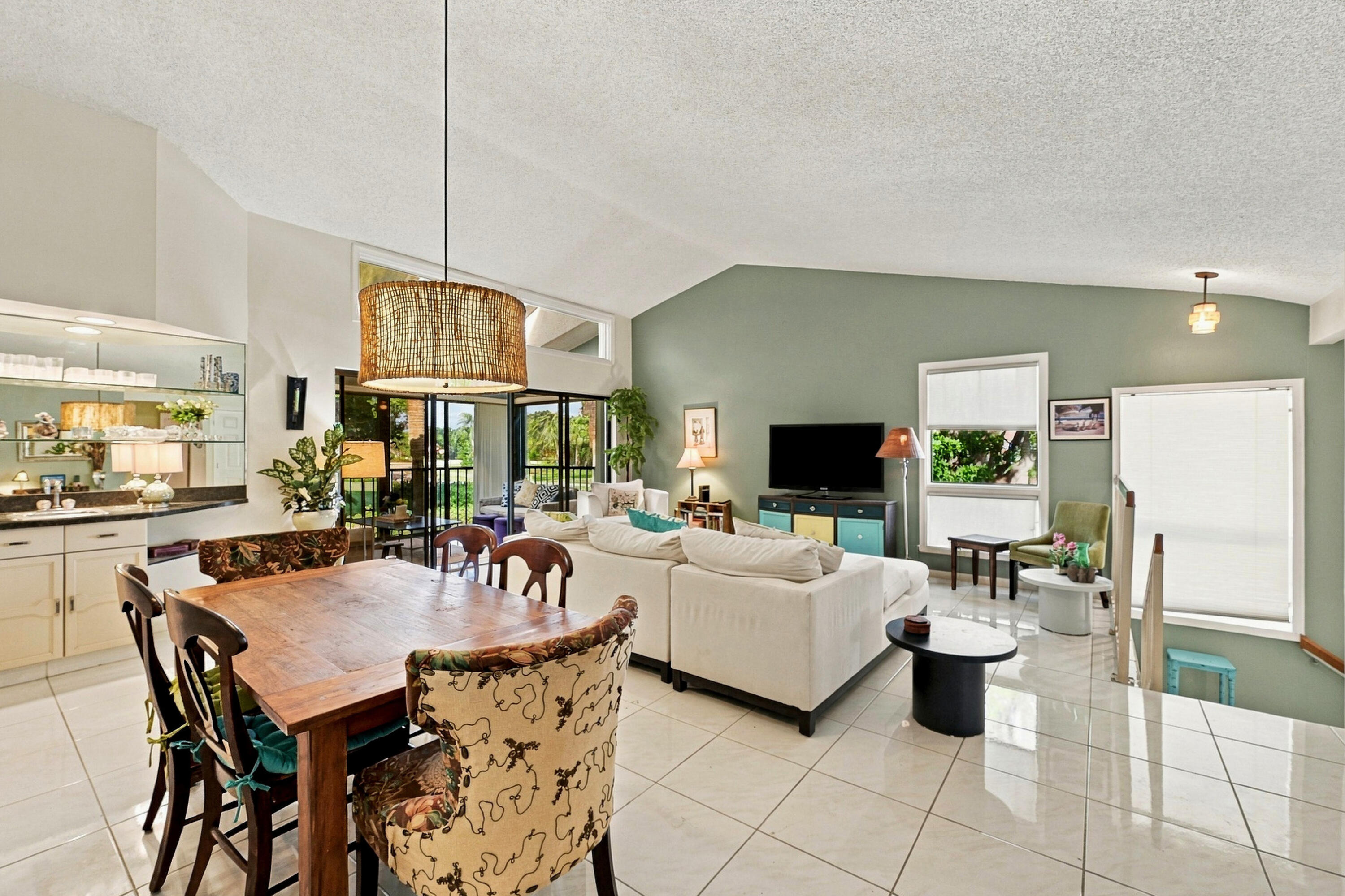 See how expansive with lovely white floors