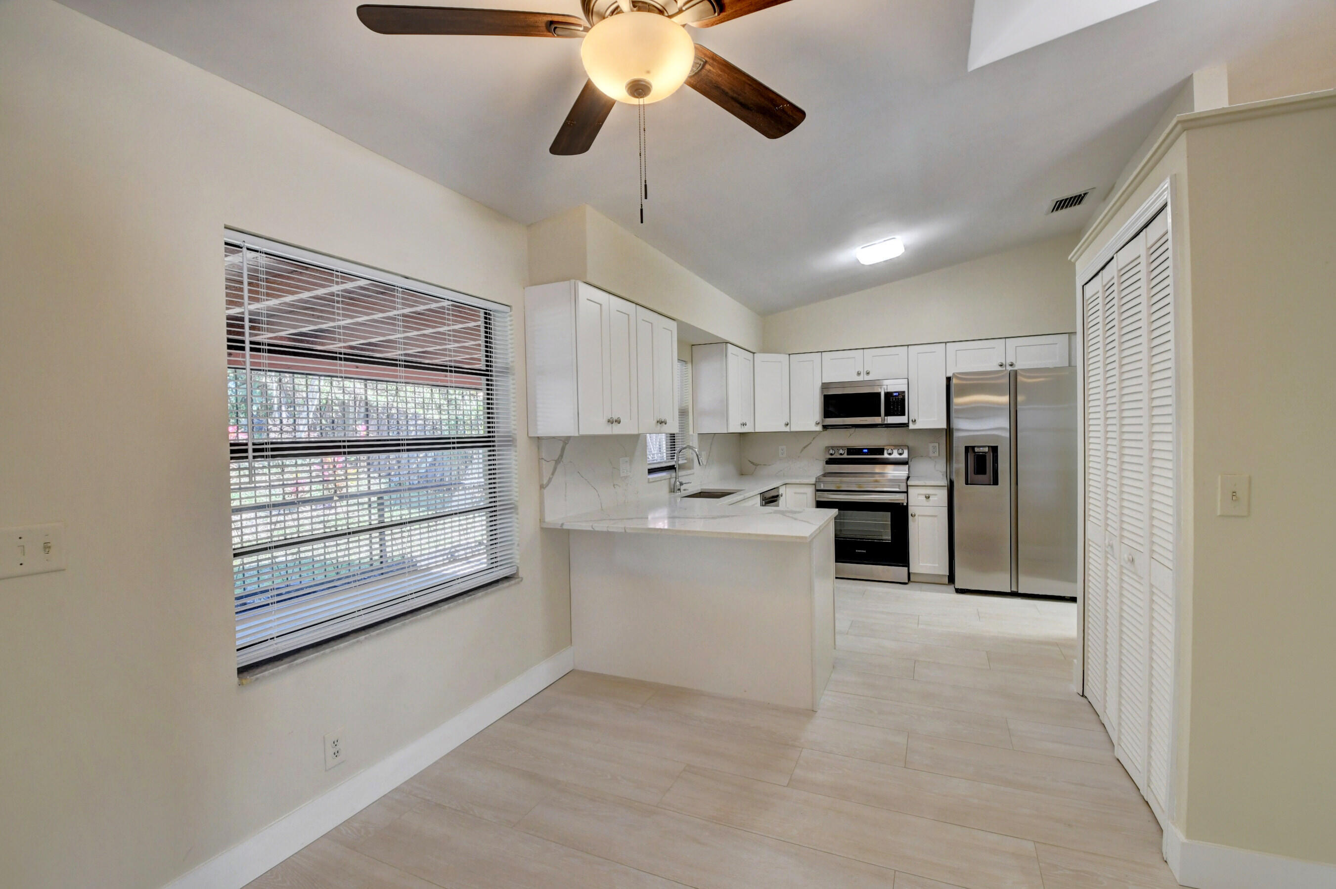 Bright Kitchen with Breakfast Bar
