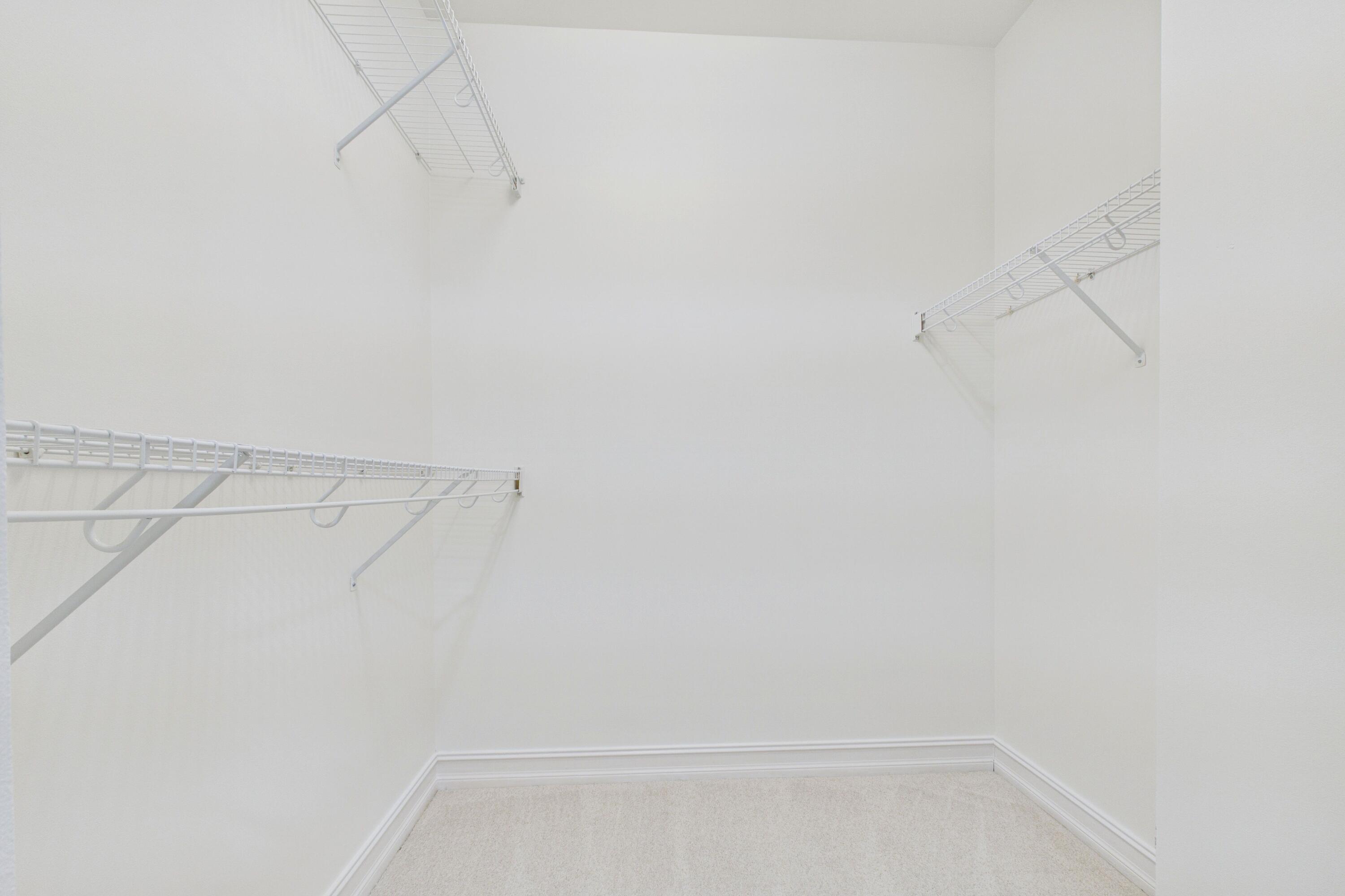 Larger of two walk-in closets