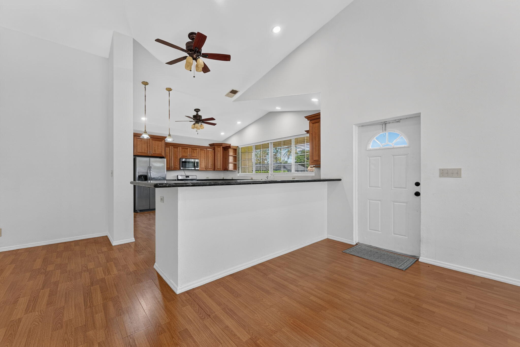 Open concept with vaulted ceilings Open concept with vaulted ceilings
