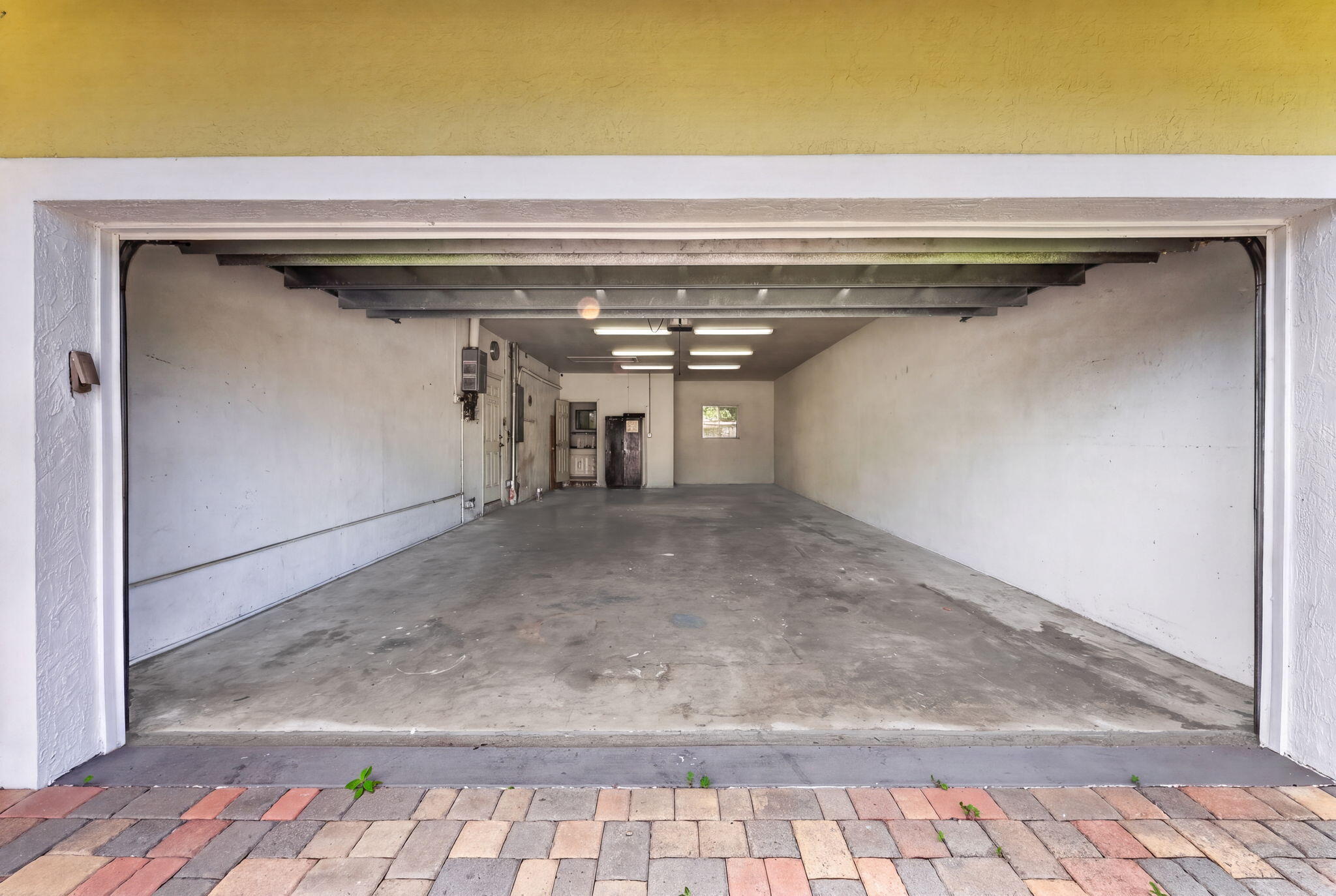 4 car garage (back can potentially be converted to an in-law suite or rental apt. (subject to zoning and permitting)