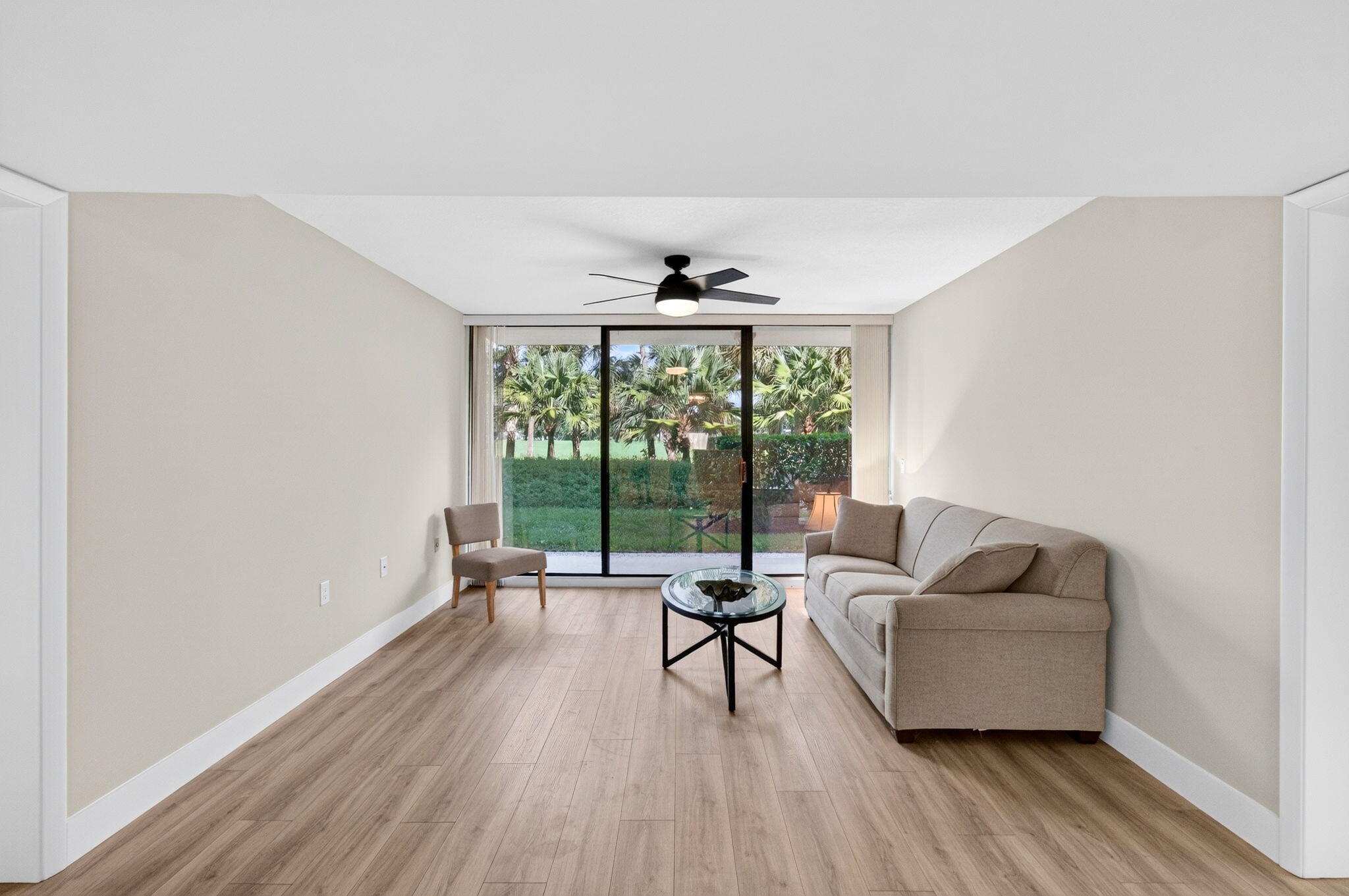Freshly painted newer laminate floors. Walk out patio with views of the golf course