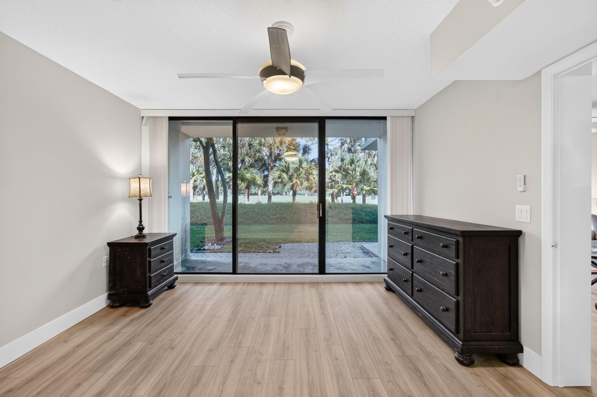 Newer laminate floors walk out patio with peaceful views of the golf course