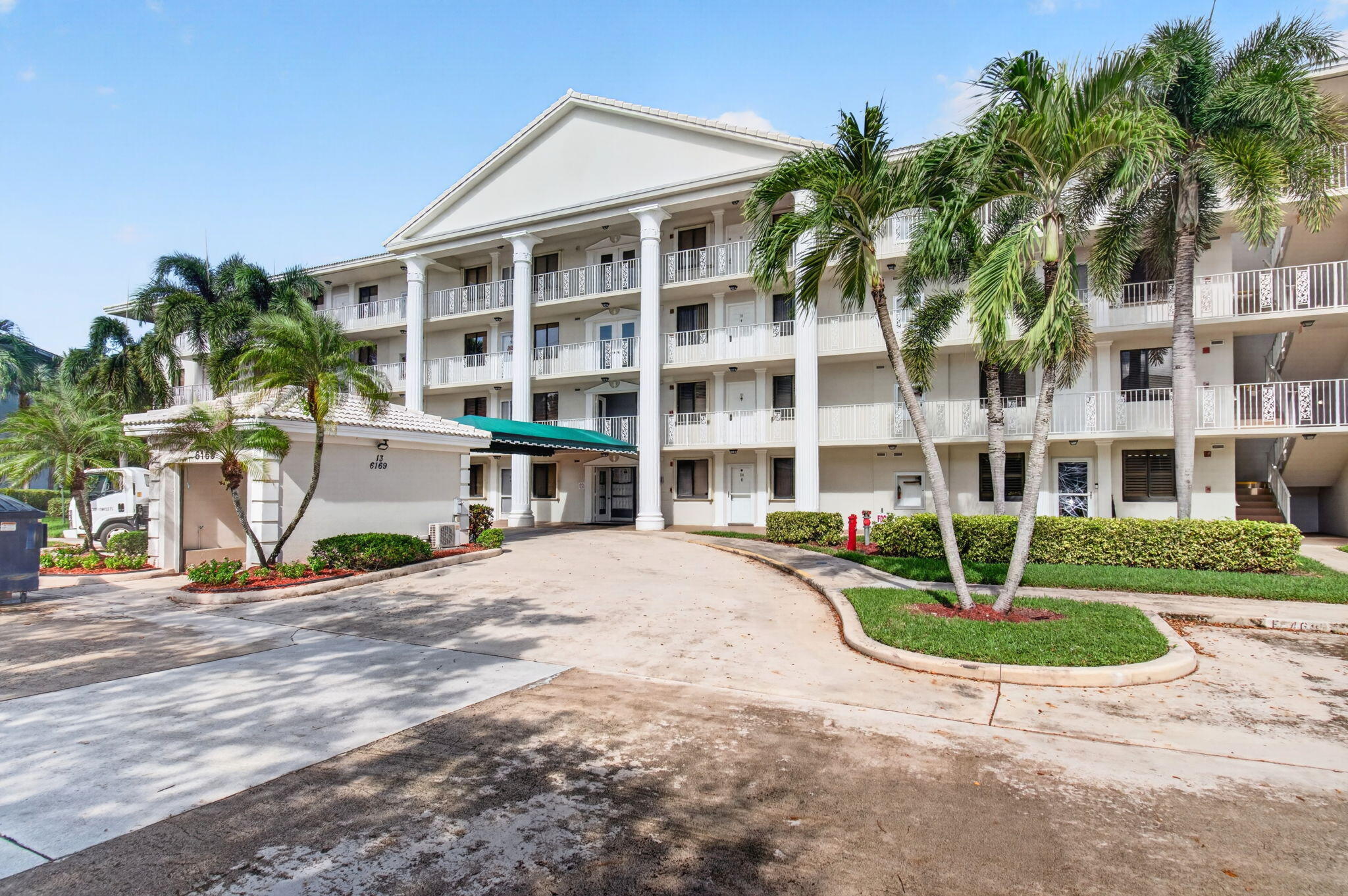 Make this 1st floor unit with golf views yours. Freshly painted and newer laminate floors