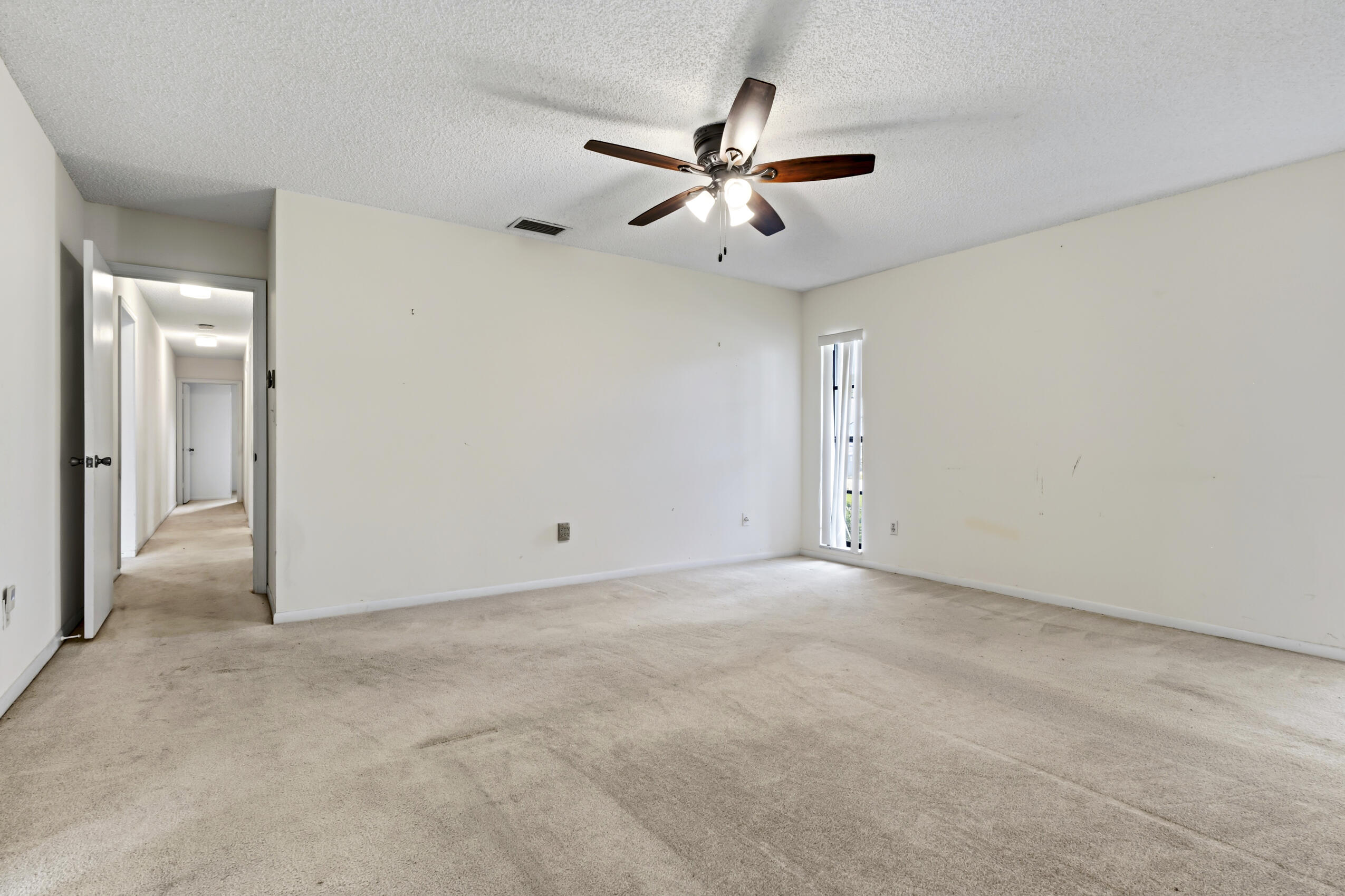 Primary Bedroom w/ Walk-in Closet