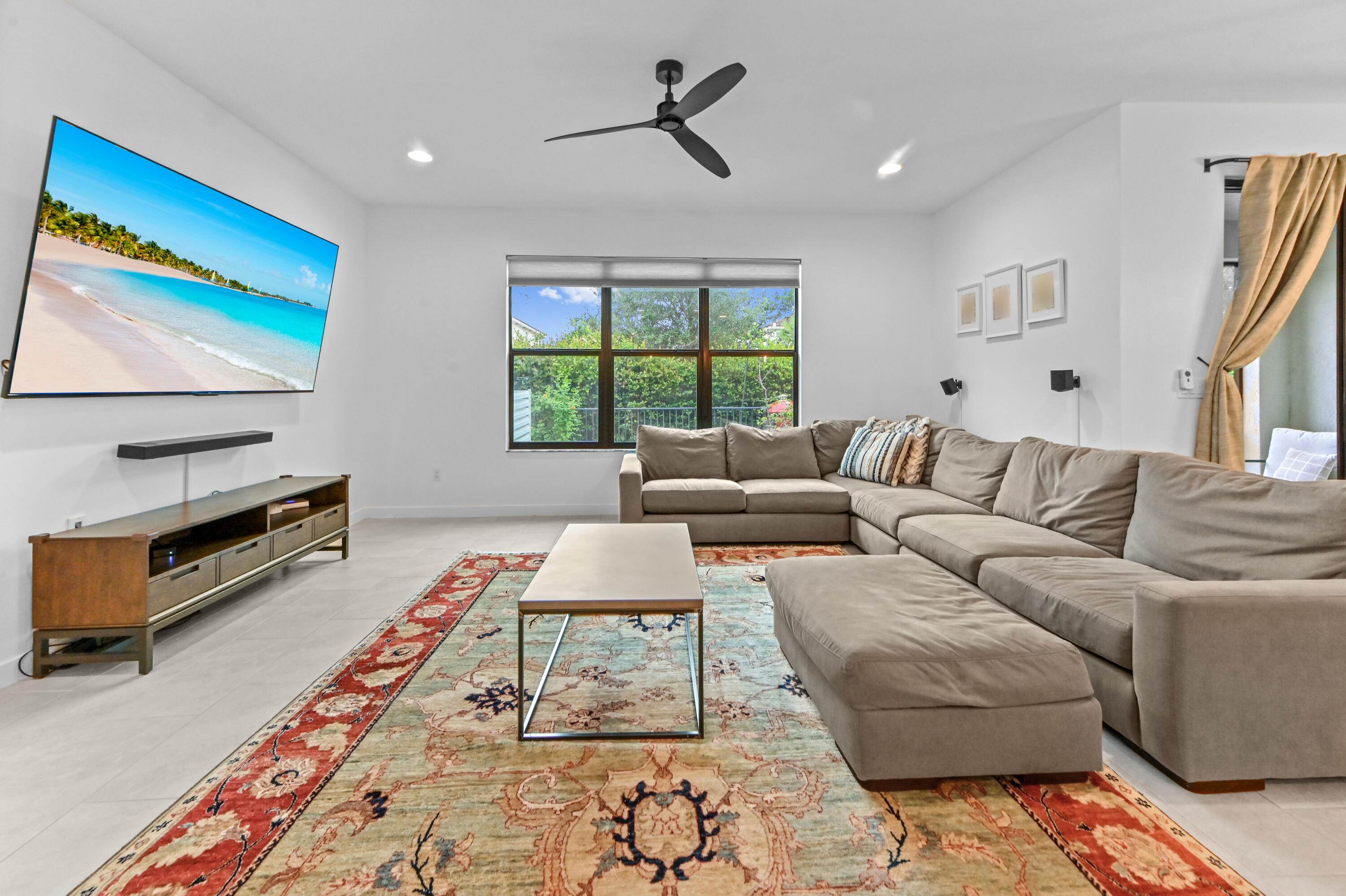 Spacious Living Room with high ceilings, recessed lighting and ceiling fan Spacious Living Room with high ceilings, recessed lighting and ceiling fan