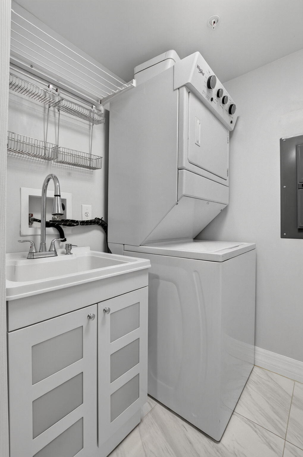 Dedicated Laundry & Utility Space with a sink