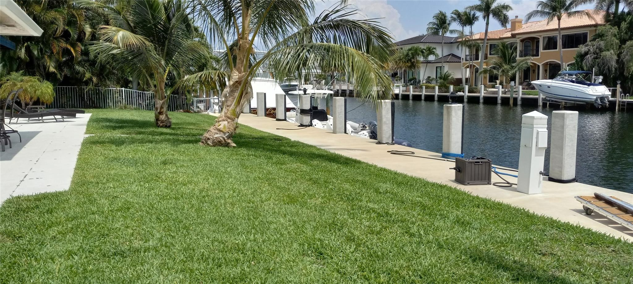 Nice grass area between pool and dock