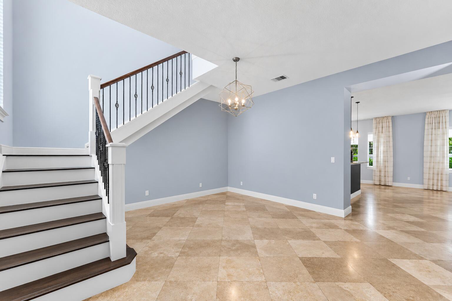 Airy Modern Foyer with Geometric Chandelier