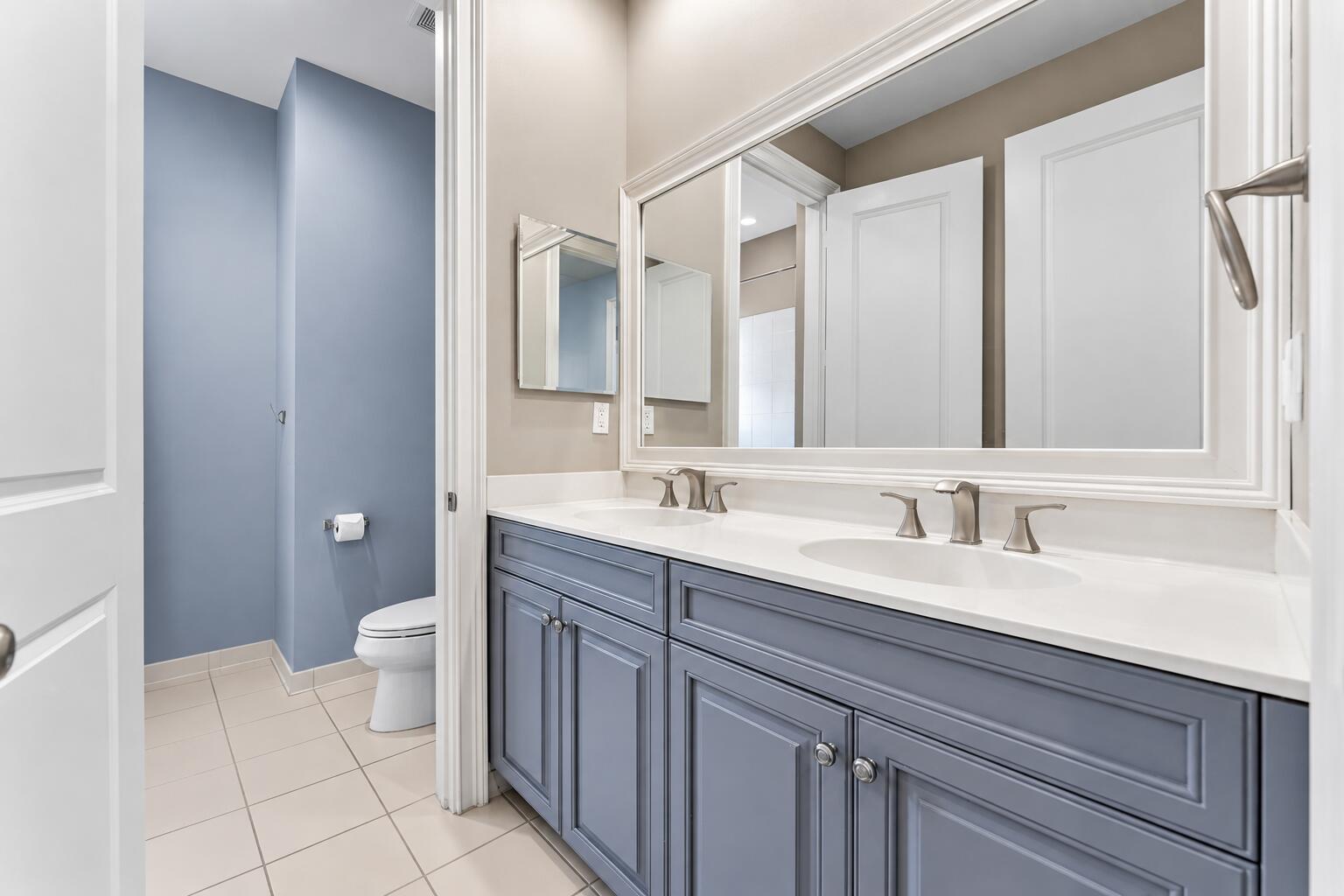 Guest bathroom upstairs with double vanity