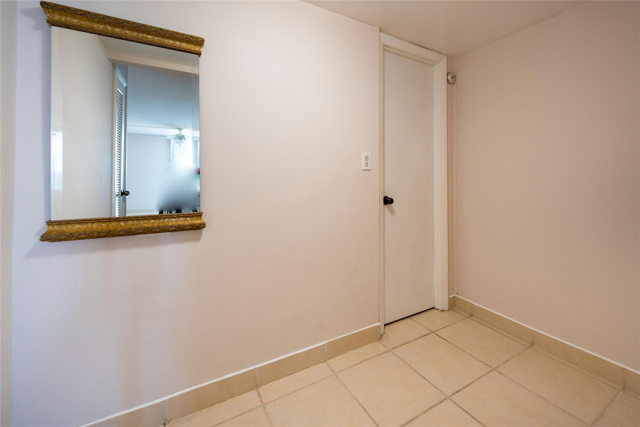 second door into primary bedroom