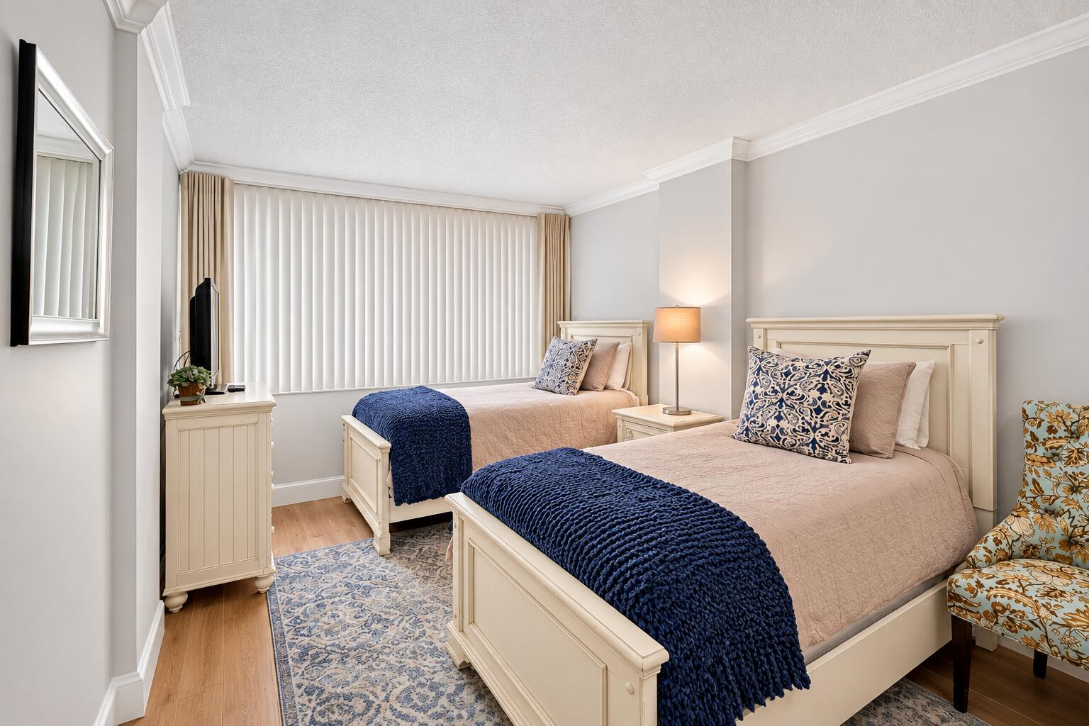 Staged Twin Bedroom with Navy Throws (2)