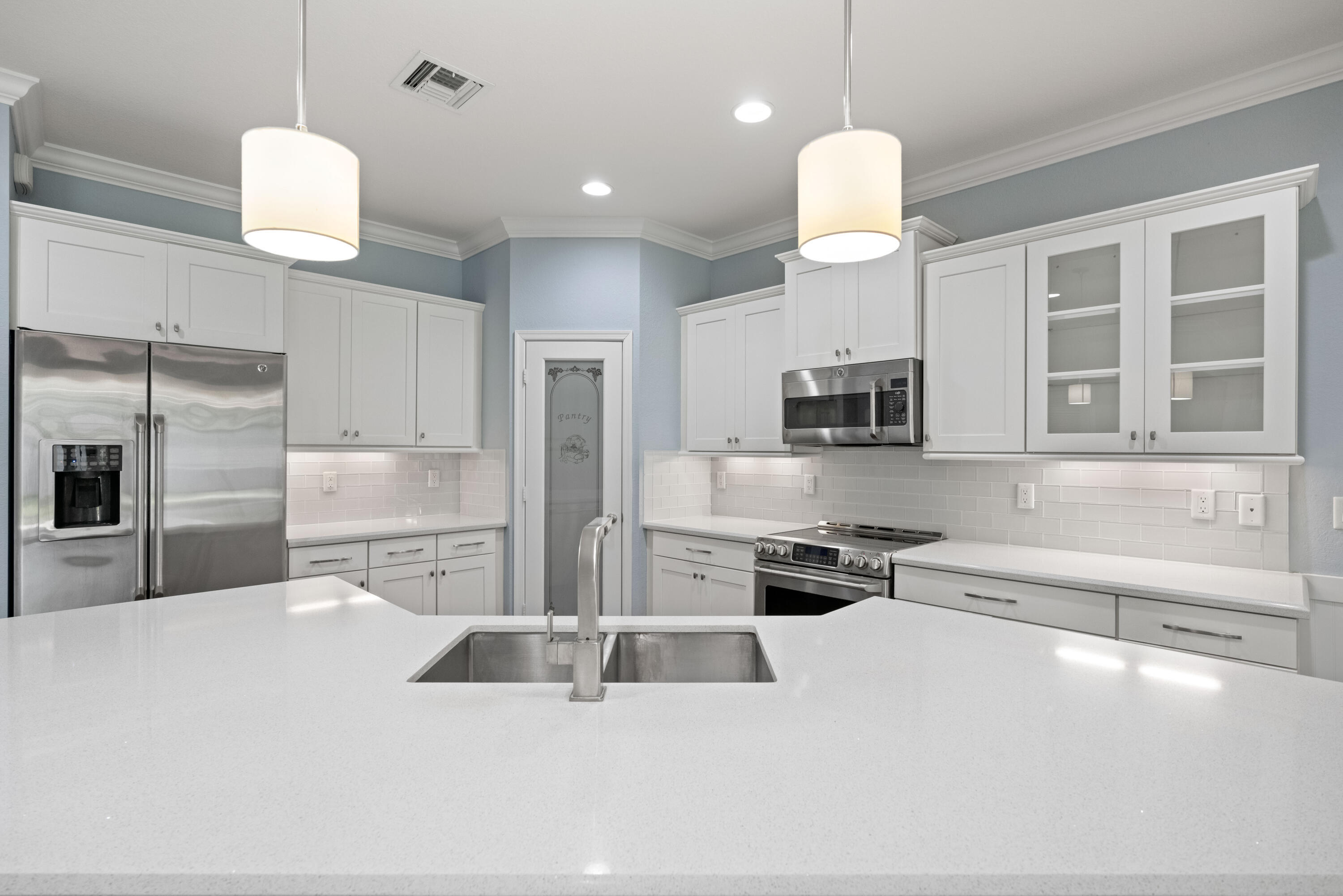 Pendant lights over center island