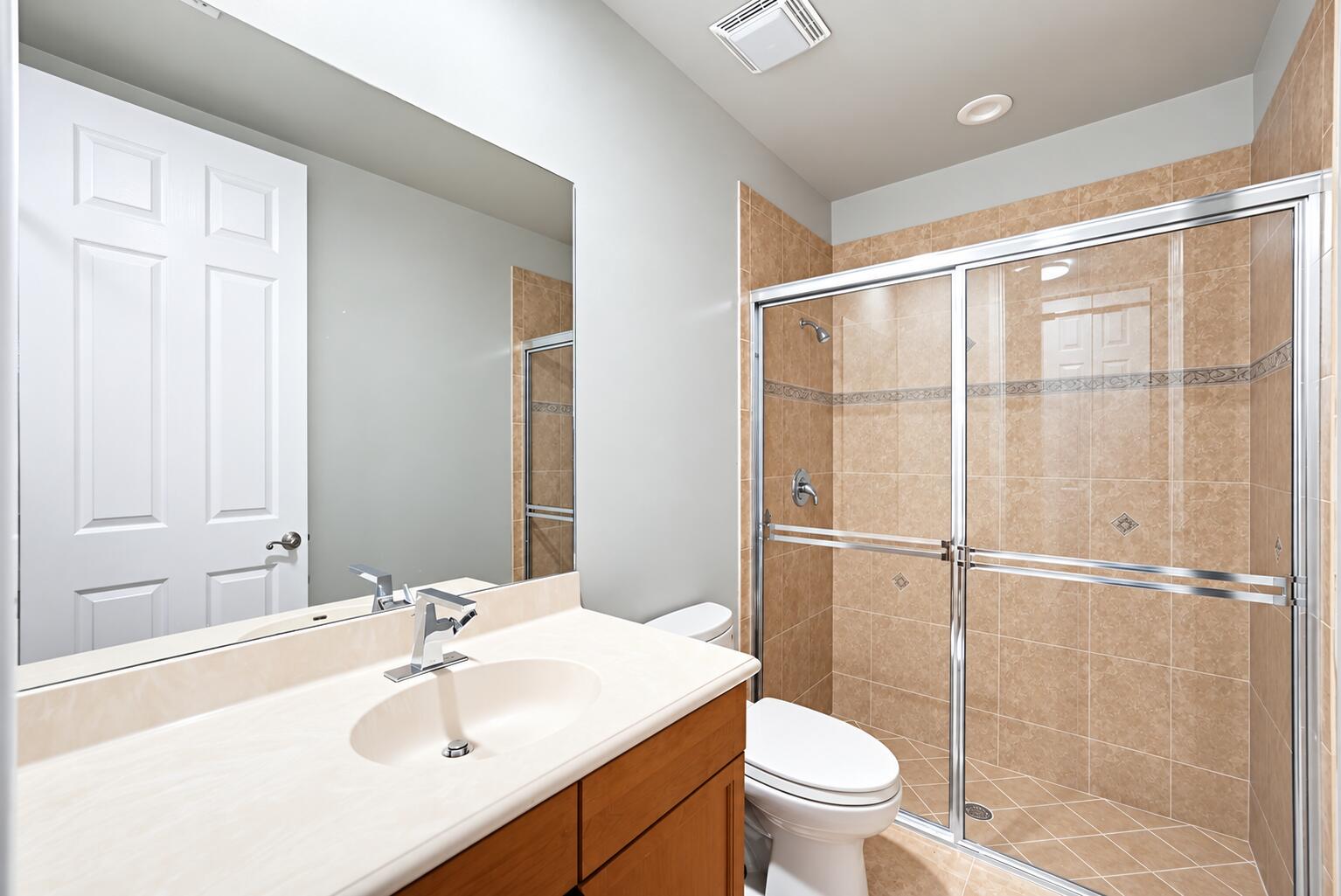 Bright Modern Bathroom with Glass Shower