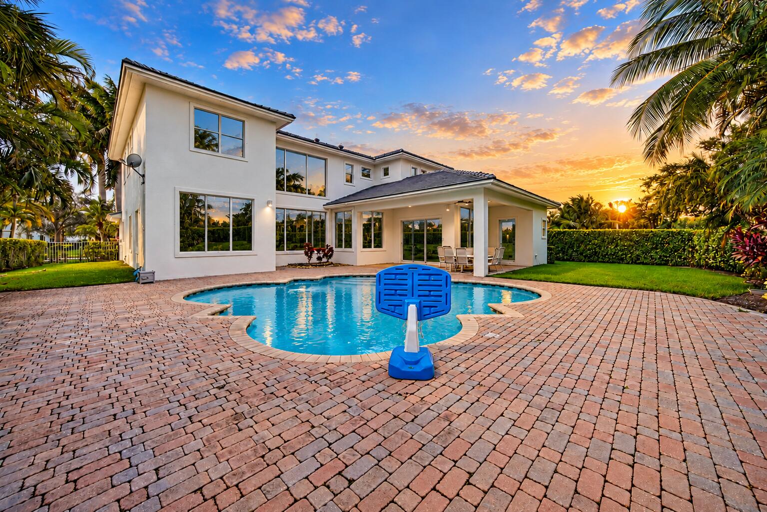 Luxury Tropical Poolside at Sunset