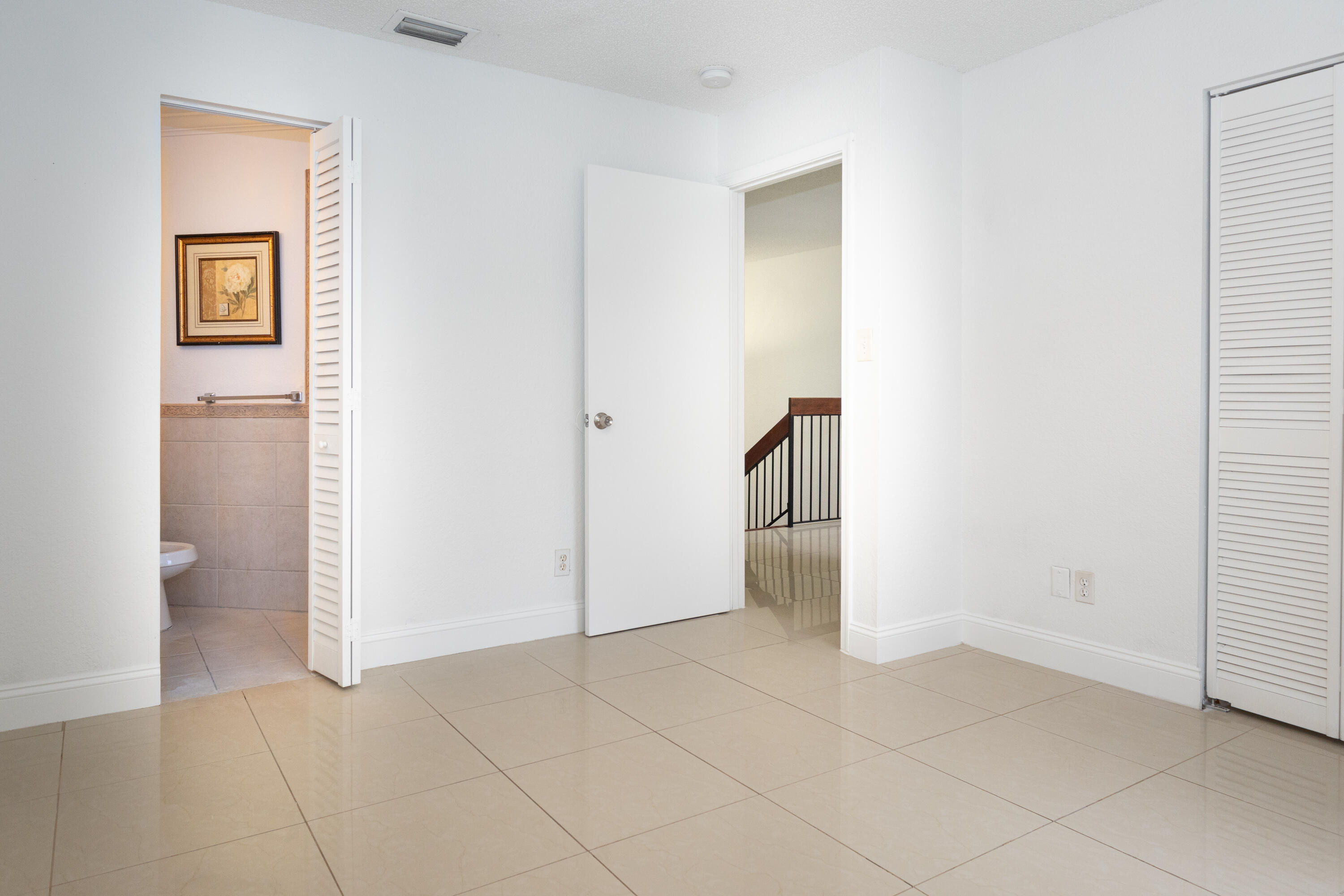Spacious open floor plan with ceramic tile flooring throughout