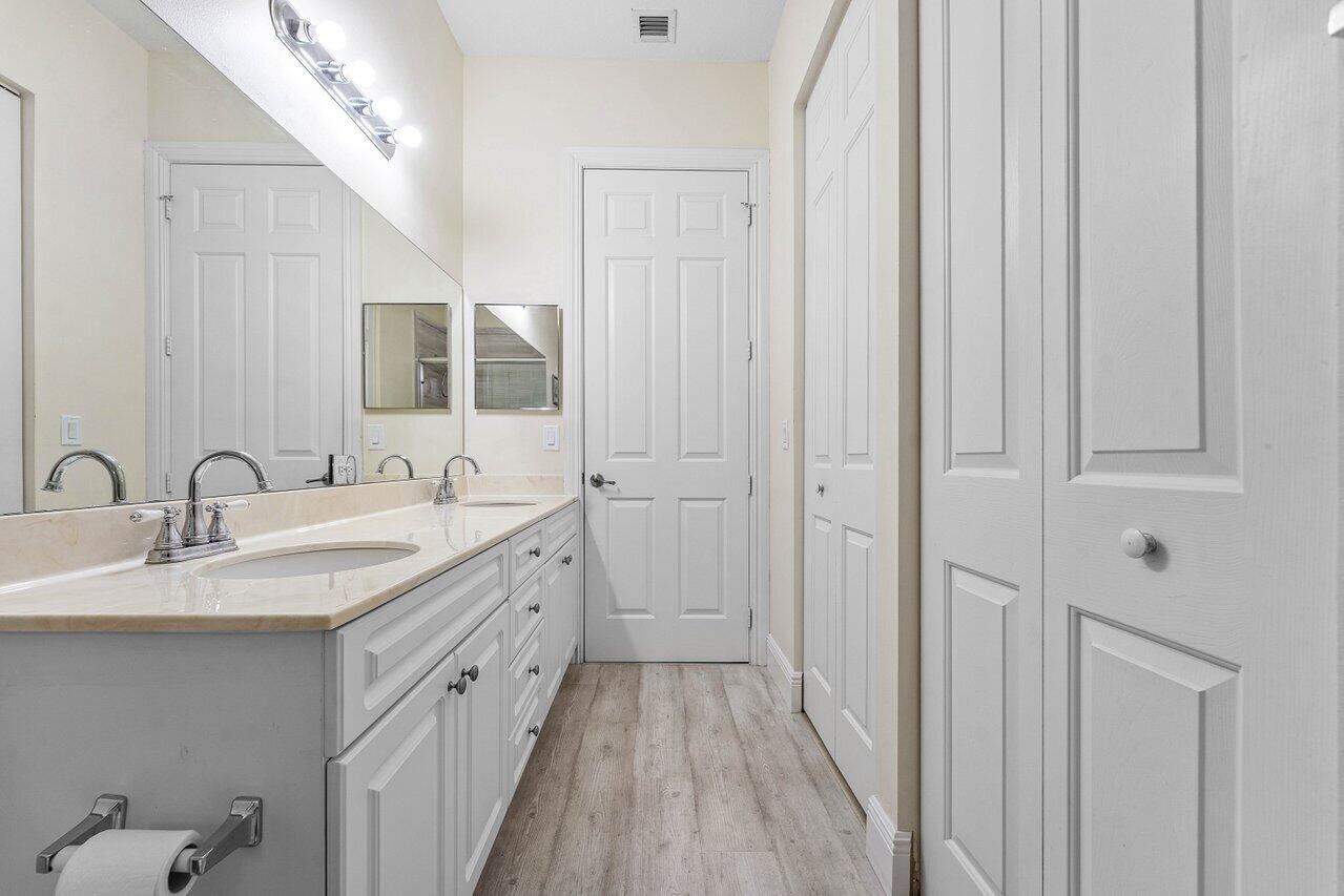 Large His-and-Hers Walk-In Closets on the right