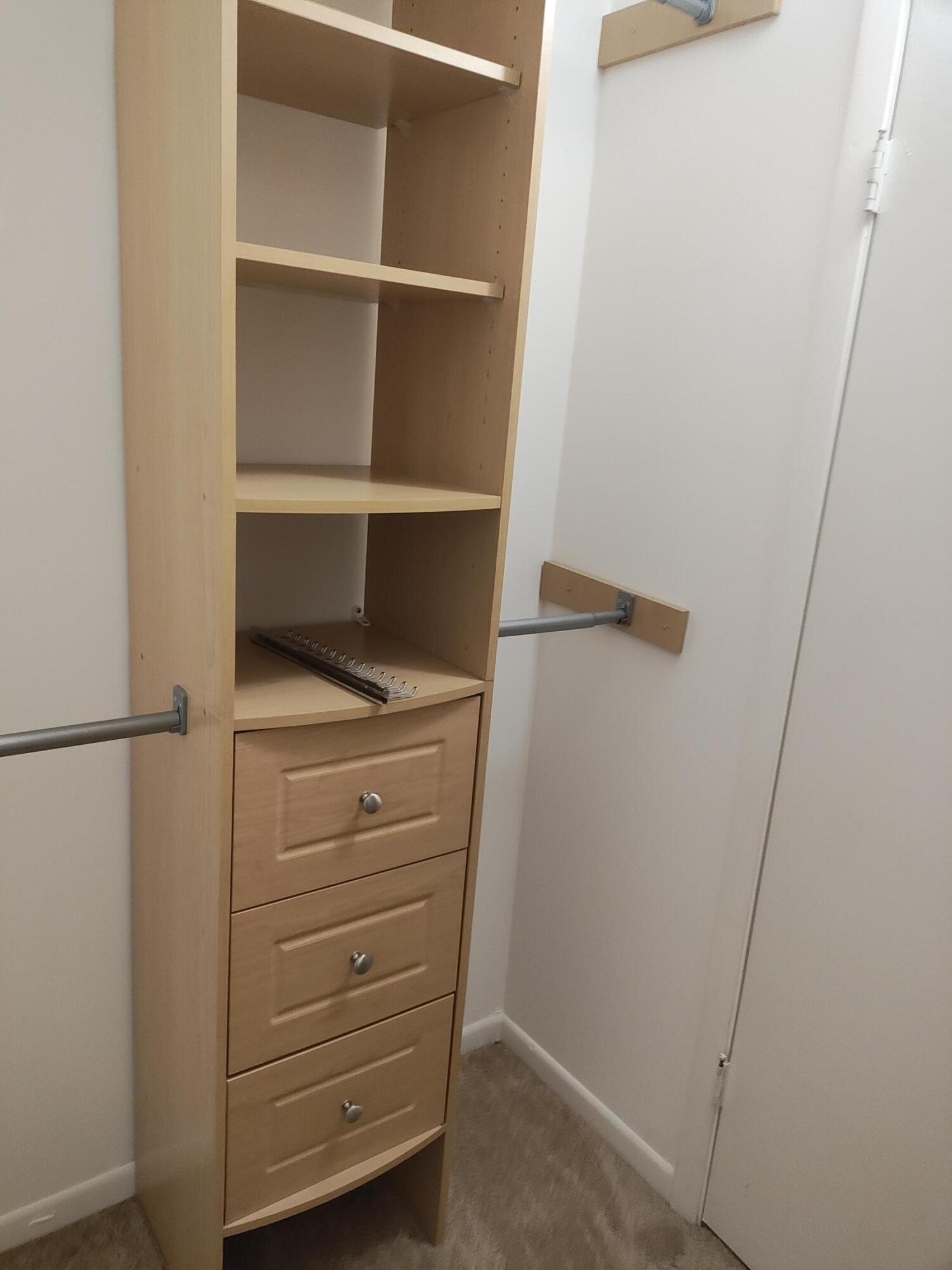 Walk-in closet with cabinetry