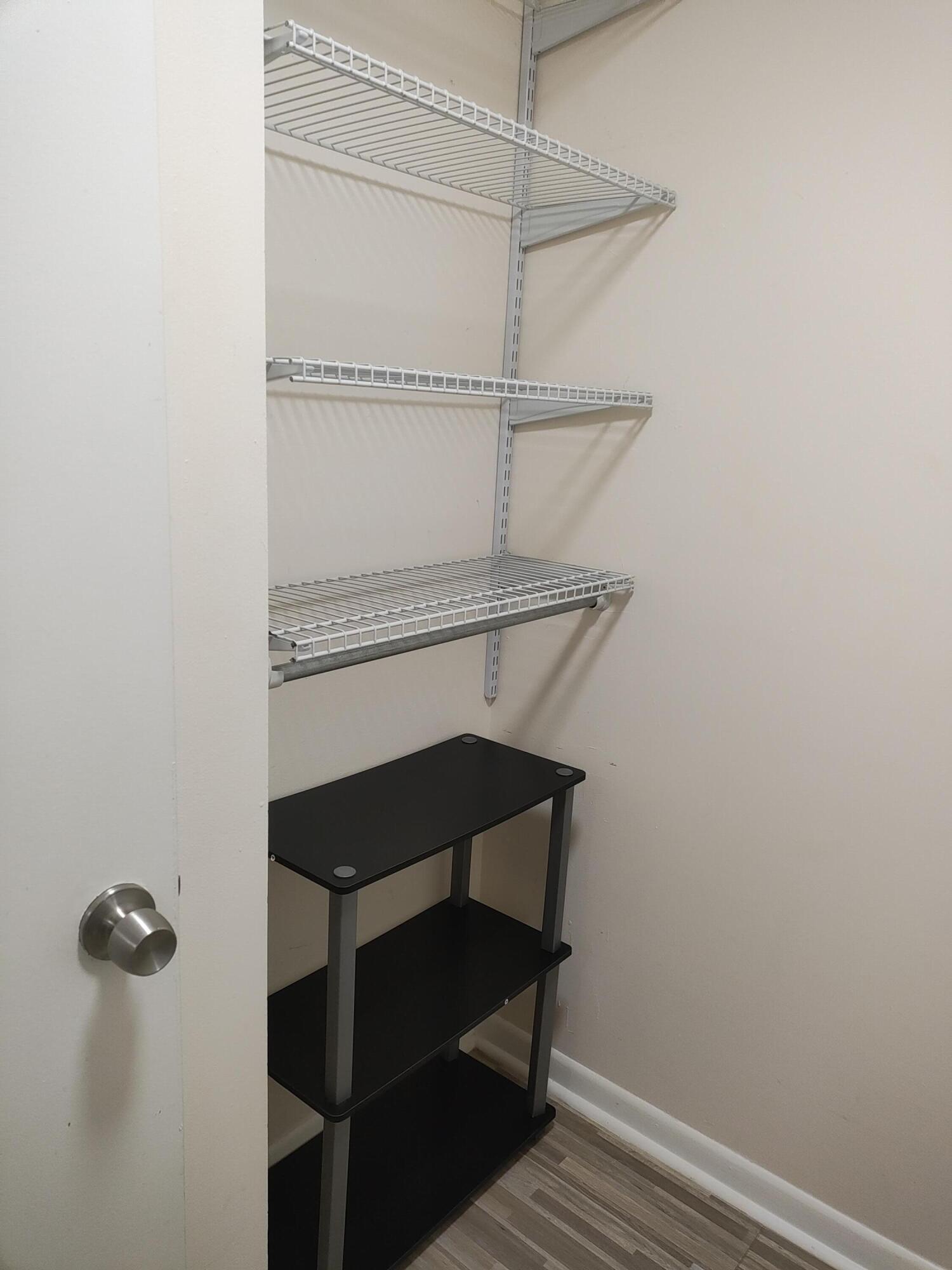 Storage with shelving in laundry room