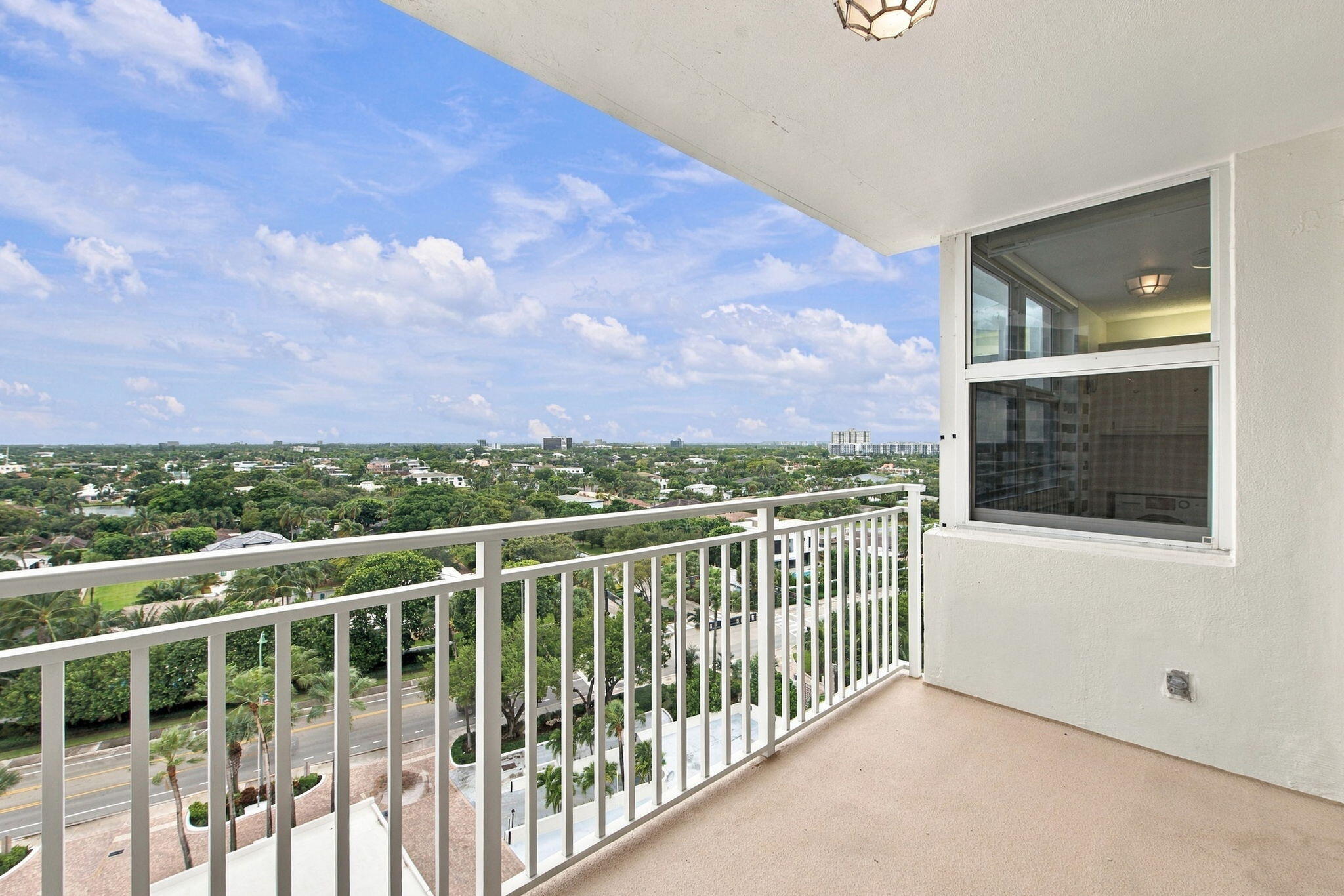 VIEW FROM OTHER SIDE OF BALCONY.