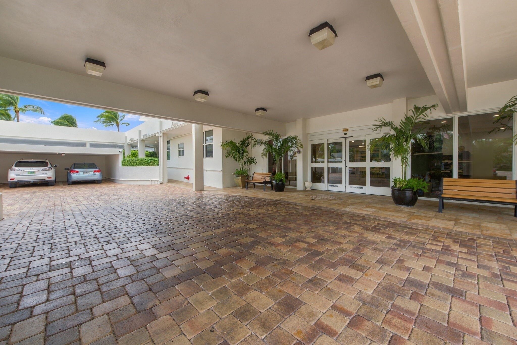 MAIN ENTRANCE. BUILDING HAS ALL HIGH IMPACT GLASS. MAIN ENTRANCE. BUILDING HAS ALL HIGH IMPACT GLASS.
