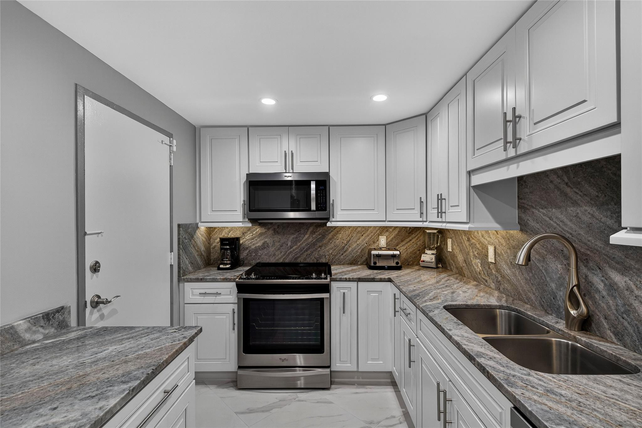 Kitchen showing sink