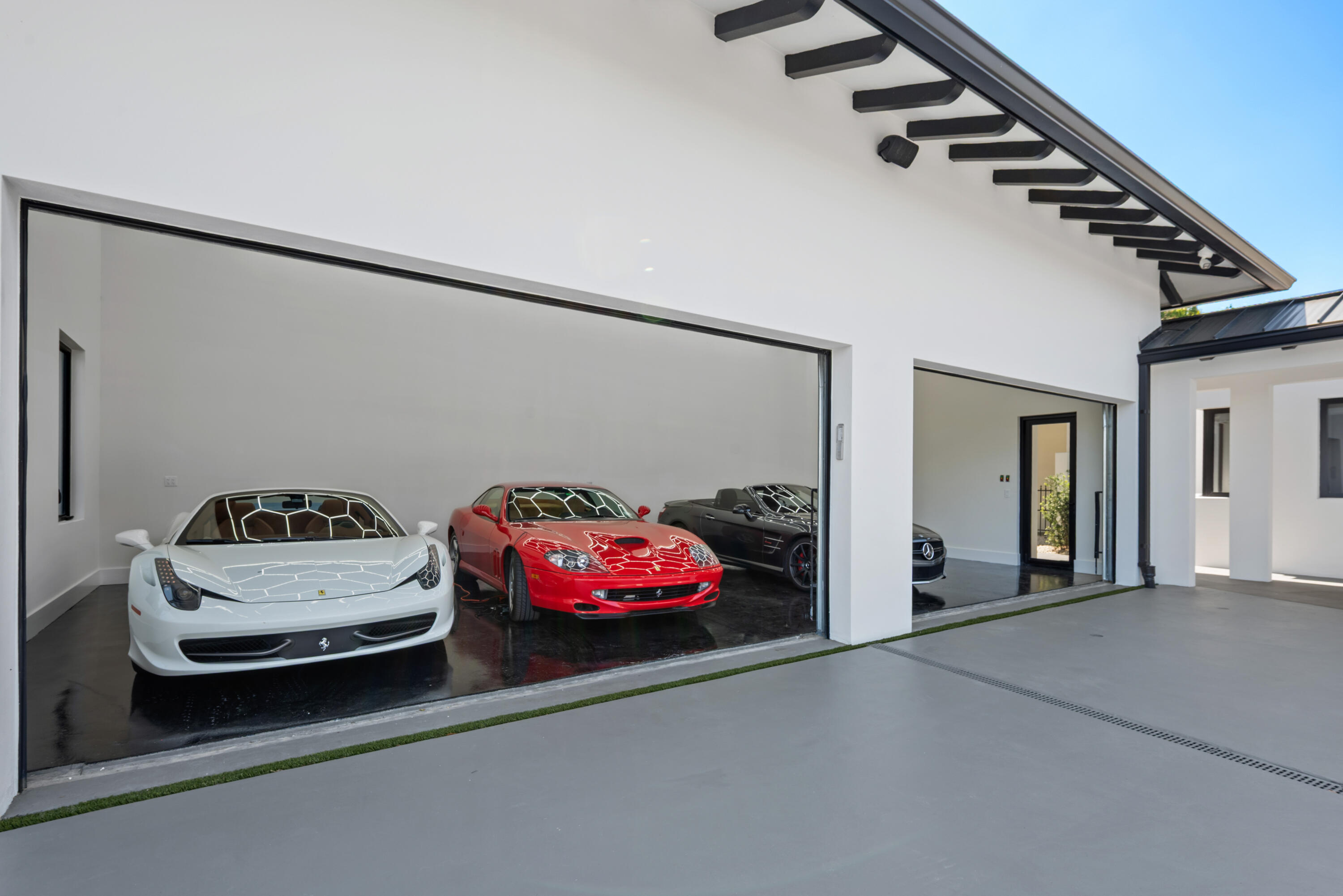 4 Car Garage Can Accomodate 8 Cars with Lifts