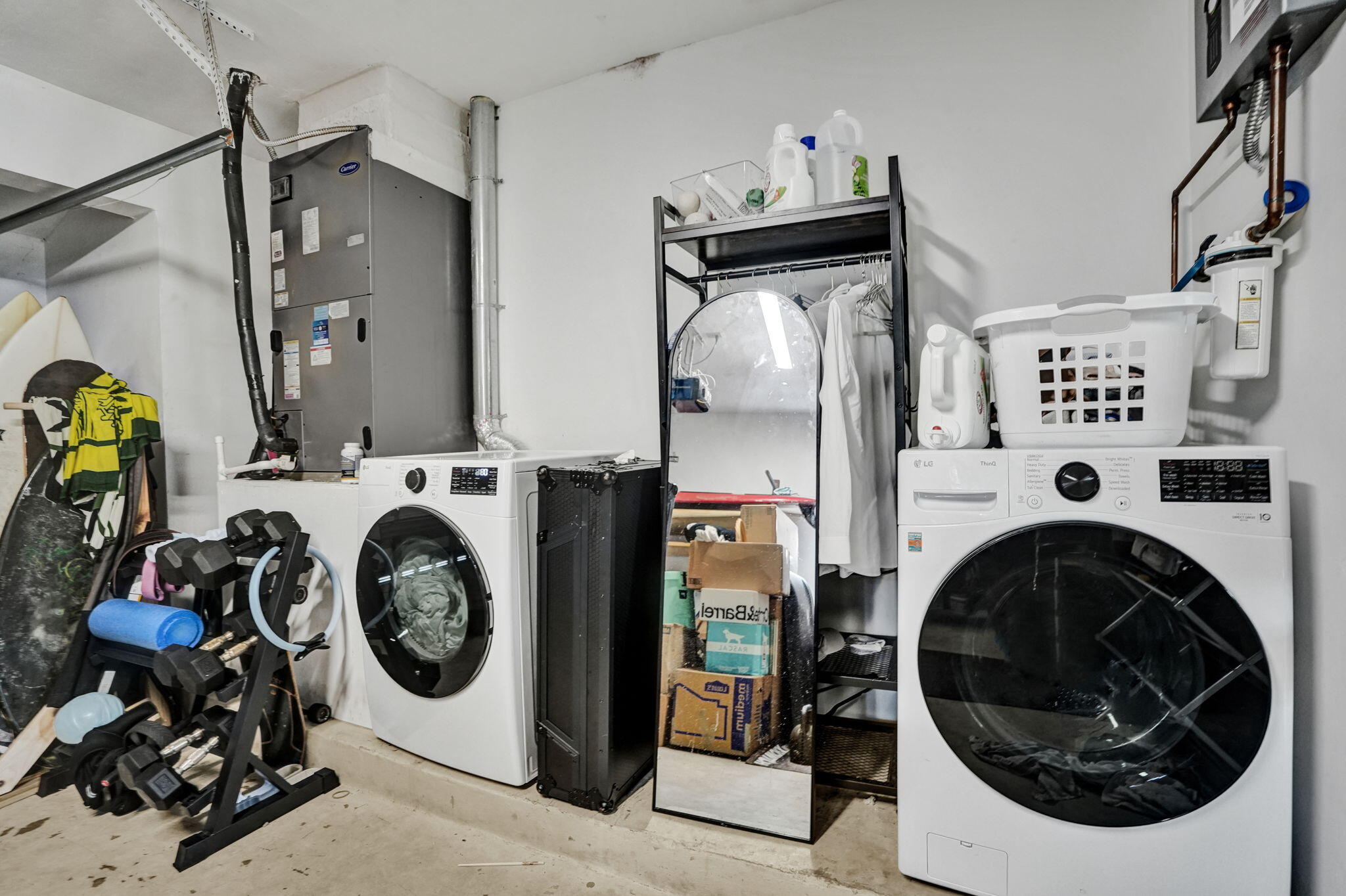 Newer LG Washer/dryer in garage.