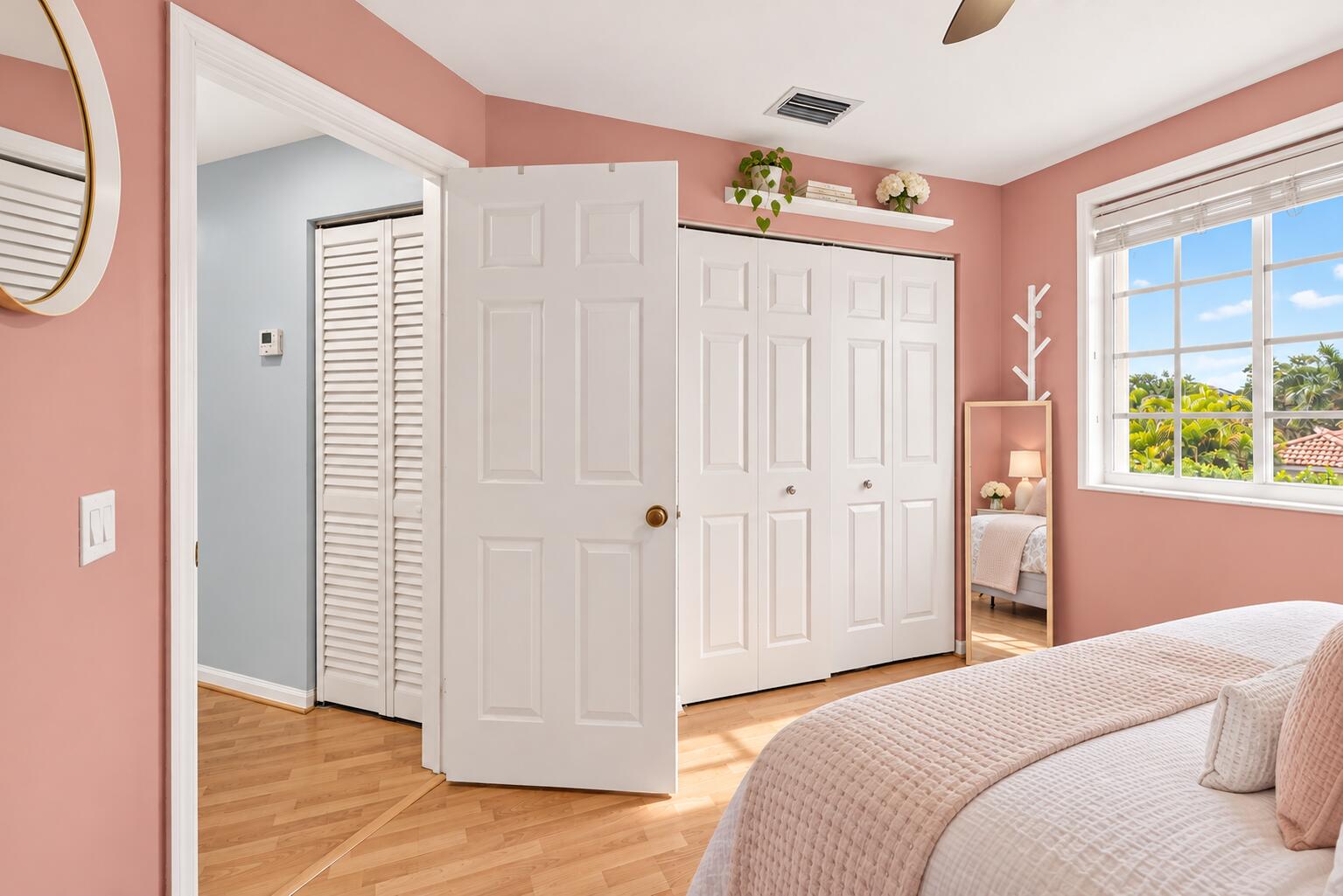 Bright Blush Bedroom with Tropical Views