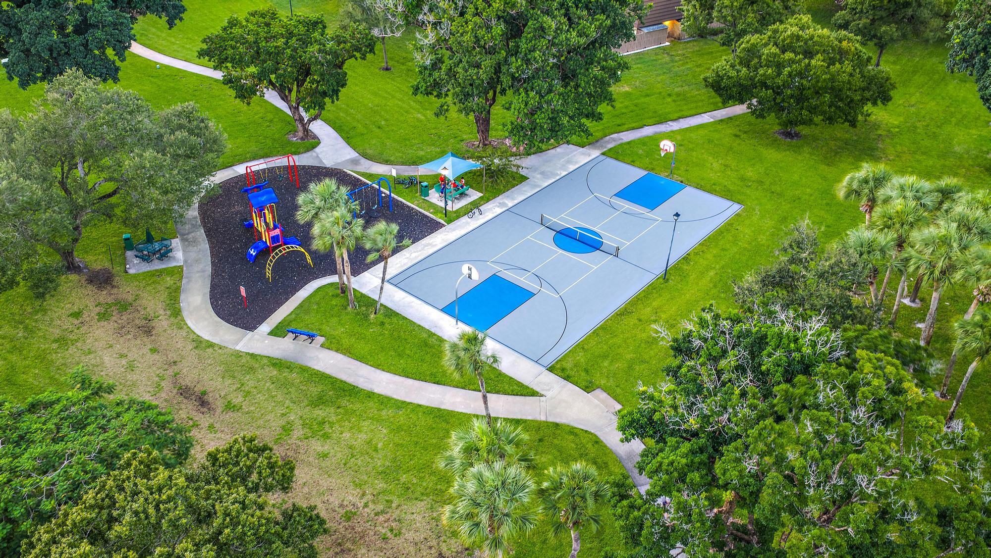 Basketball/pickleball court and playground
