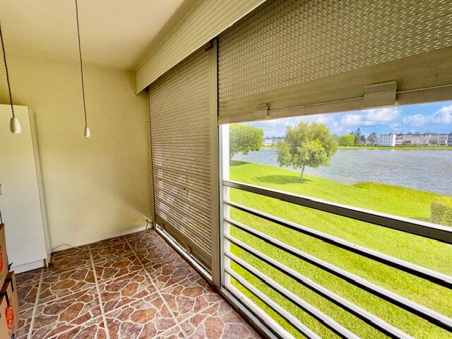 Screened Patio W/Pull Downs