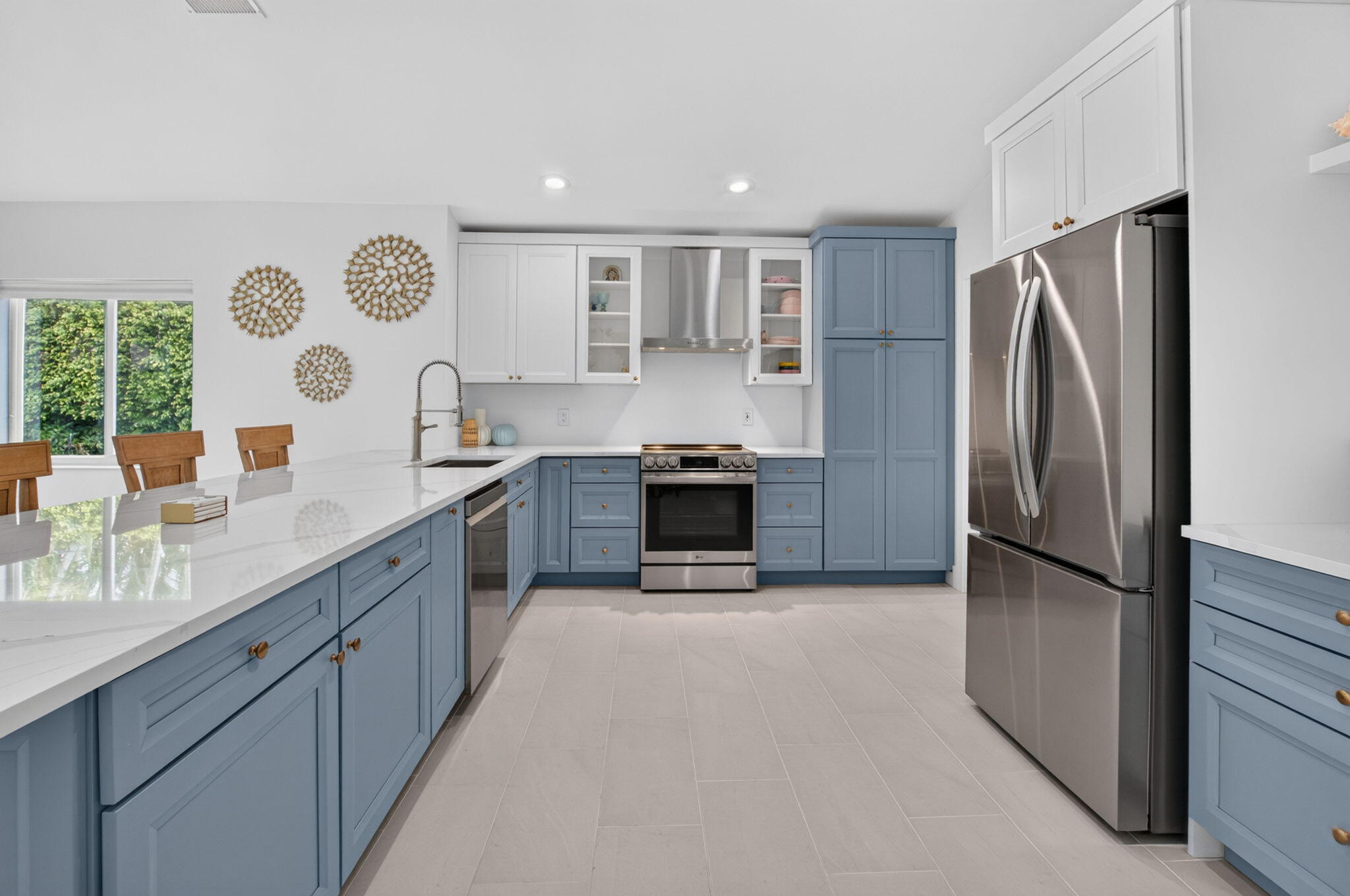 Upgraded cabinetry, quartz countertops, new appliances