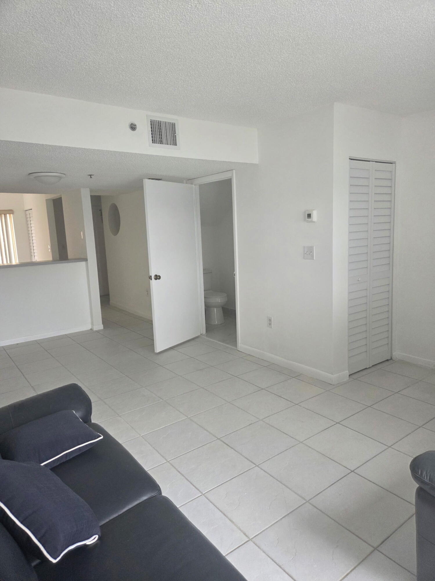 B - Living & Dining area with half bath
