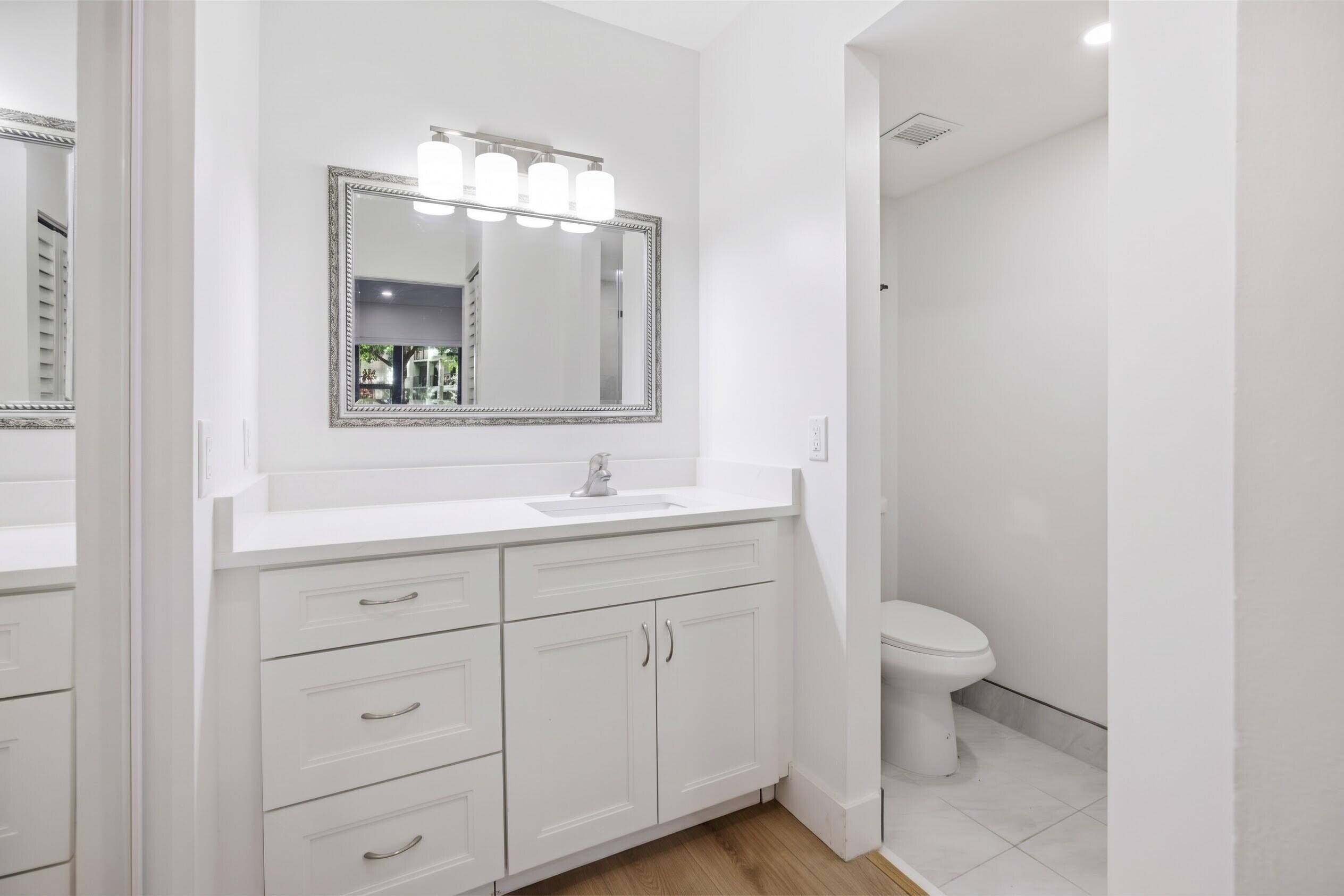 All new and nice - step in shower and bright lighting