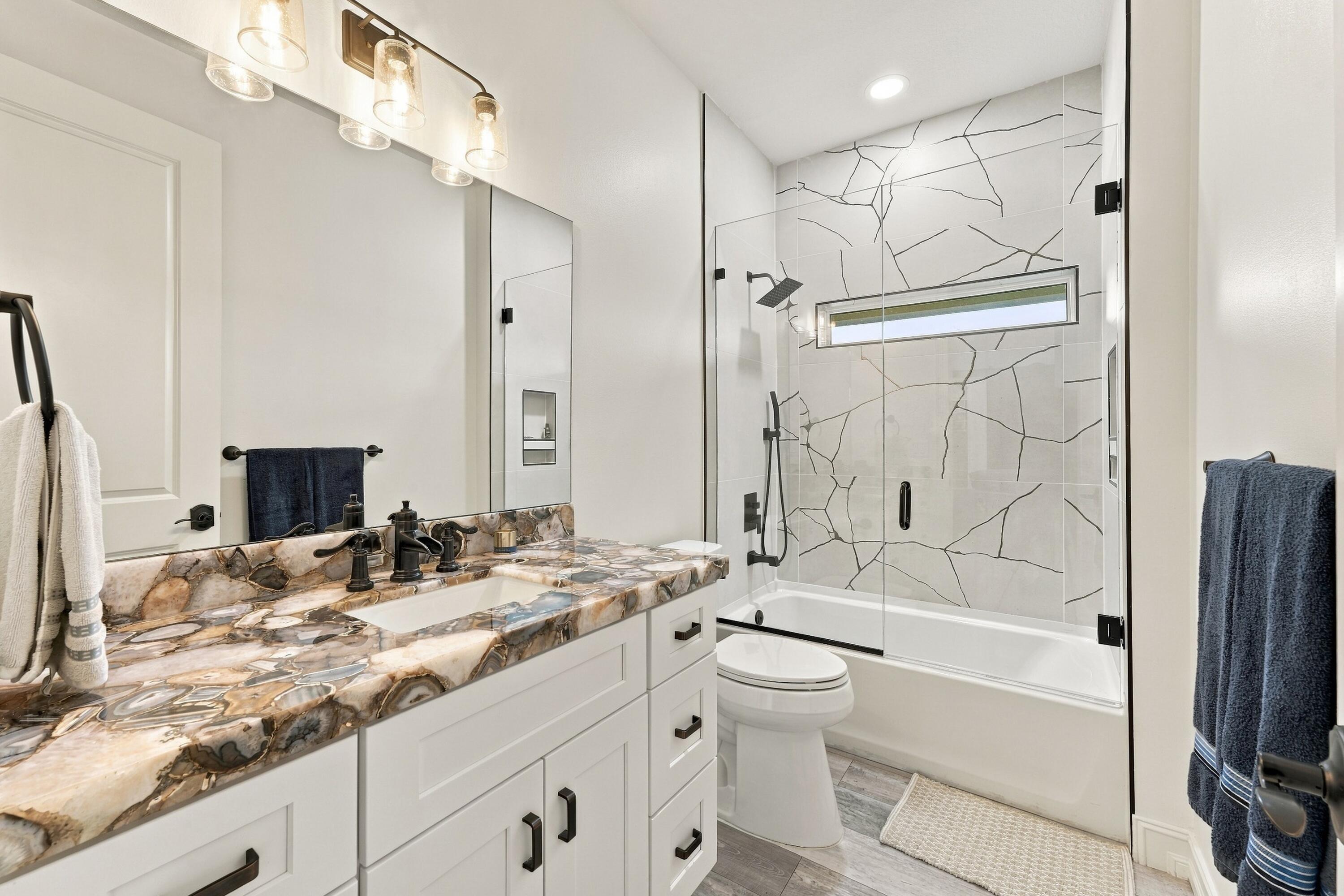 Full Bathroom with Custom Finishes
